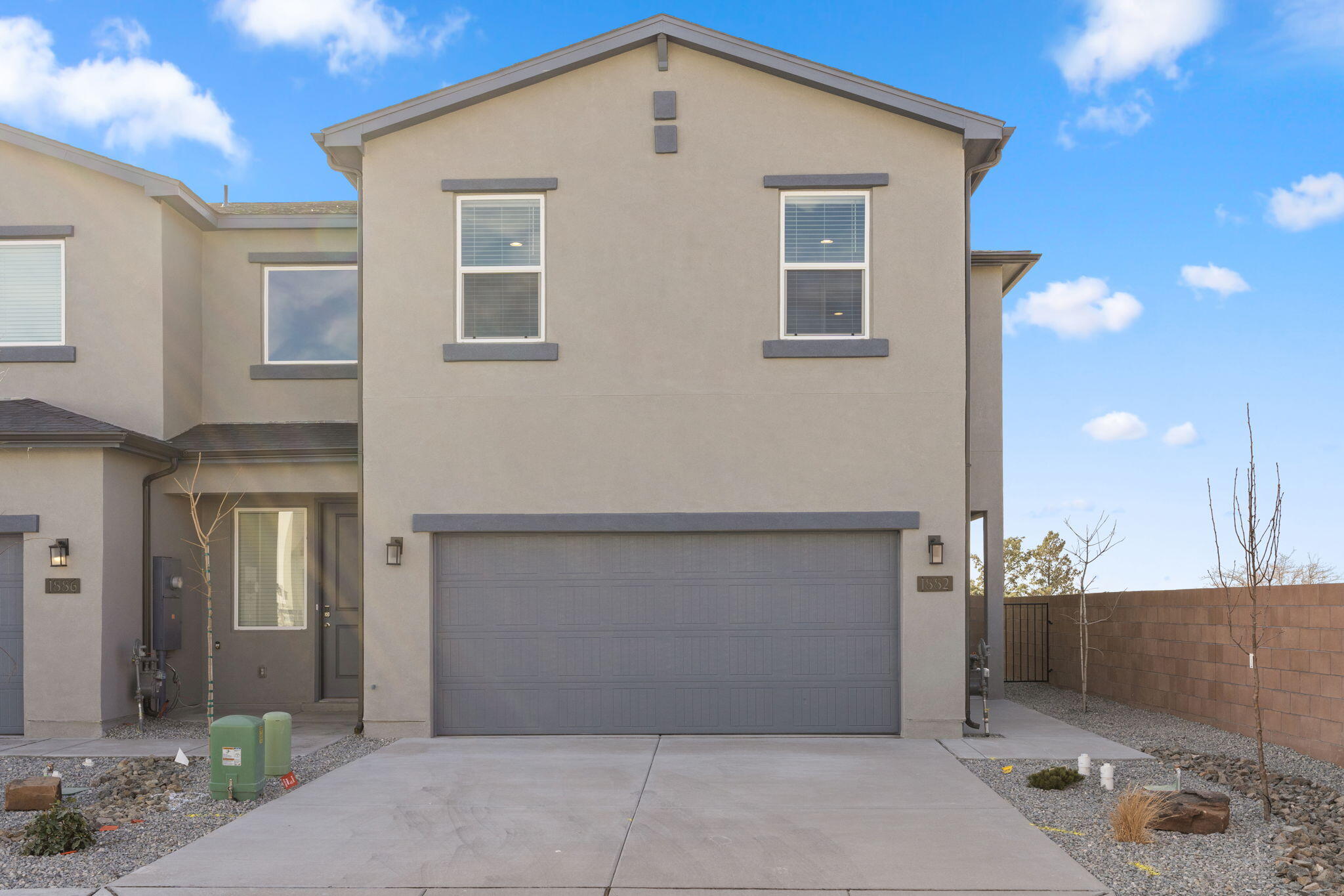 Unveiling a stunning new construction home!  This 1619 sq ft, two-story attached abode boasts three bedrooms, three baths, and an attached 2-car garage.  Enjoy modern living in this Green Build NM Gold Certified home.  Relax in the spacious primary bedroom, the private walled backyard, or the elegant kitchen with granite counters and stainless-steel appliances.  Refrigerator and washer & dryer Included!  Don't miss out on this exceptional opportunity to own a new home in an established, centrally located, and convenient neighborhood less than five minutes from Presbyterian Rust Medical Ctr.  Call today to schedule your tour or to discuss available buyer incentives!