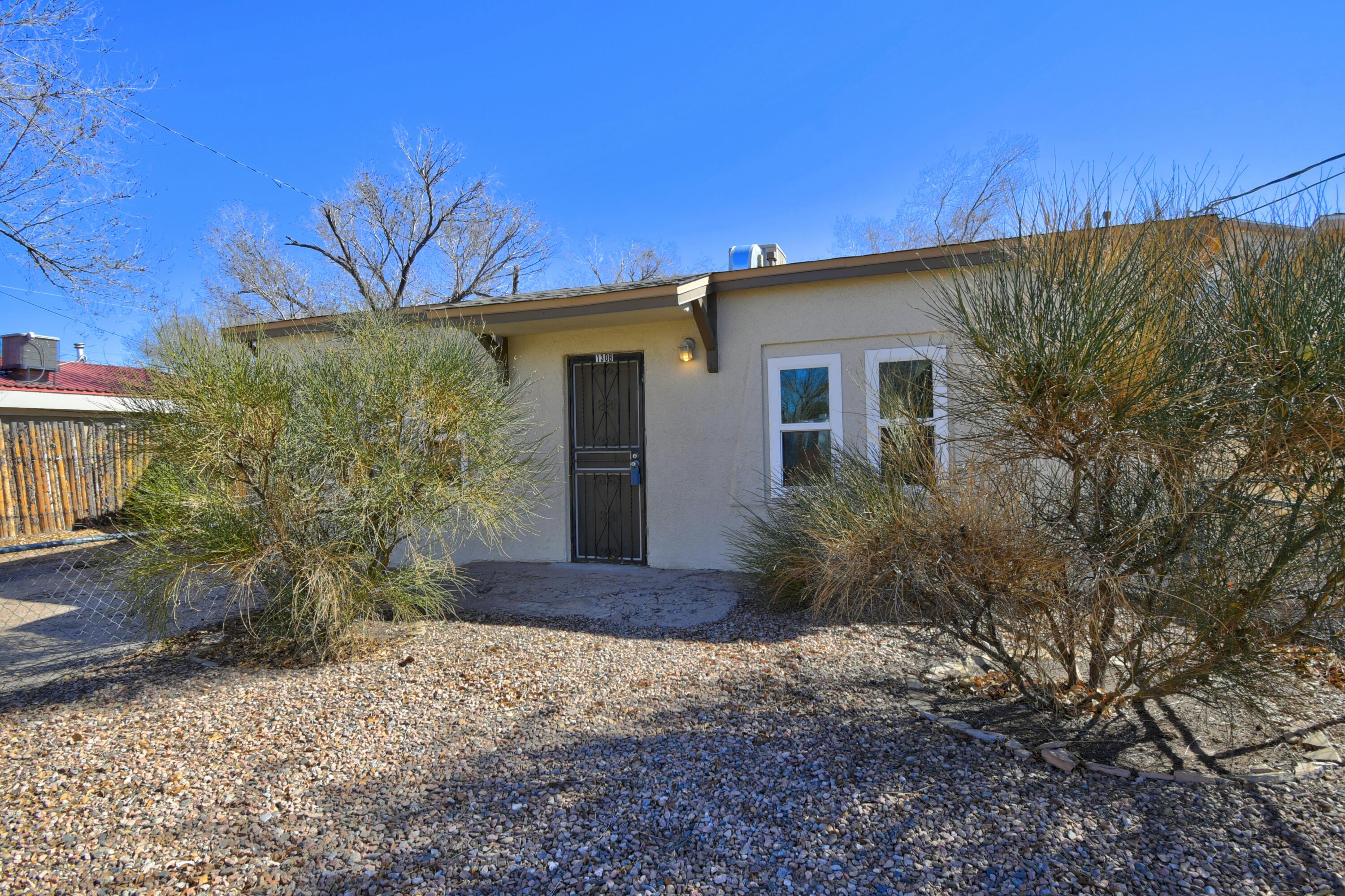 Back on the market 7/7.  Seller moved gas line and meter to the front of the property. Don't miss this updated starter home located in a secluded North Valley neighborhood.  Quick access to I40, Downtown, Old Town, bike and walking trails. Updates include roof, sewer line, complete bath remodel.  Recent interior paint and exterior stucco and trim painted. Bonus room is perfect for play room, office, or nursery. Floor plan includes Cozy living room, DR and Bright kitchen with roomy utility room.  Fenced back yard has access from utility room or side fence.