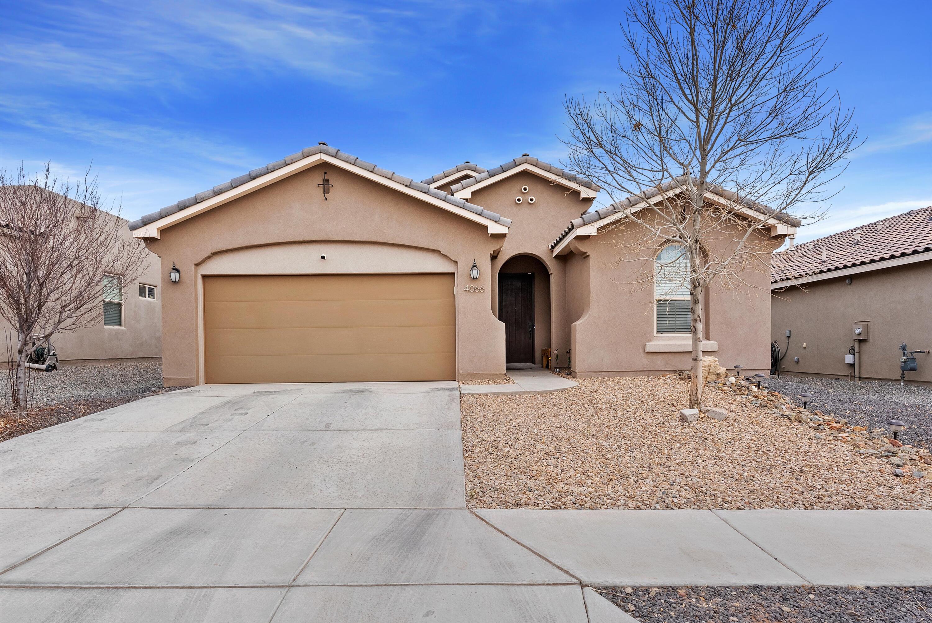 Discover this newer built 4-bedroom & 2-bathroom home in the sought-after Lomas Encantadas community. Designed in a charming Mediterranean style, this home boasts high-end upgrades and thoughtful details throughout. Step inside to find an inviting gourmet kitchen, featuring a stunning backsplash, upgraded floor tile, and a stylish barn door that adds a touch of modern elegance. The 8' upgraded doors enhance the spacious feel, while the home's NM Green Built certification ensures energy efficiency and sustainability. Don't miss the opportunity to own this beautifully designed home in a prime location. Schedule your private tour today!