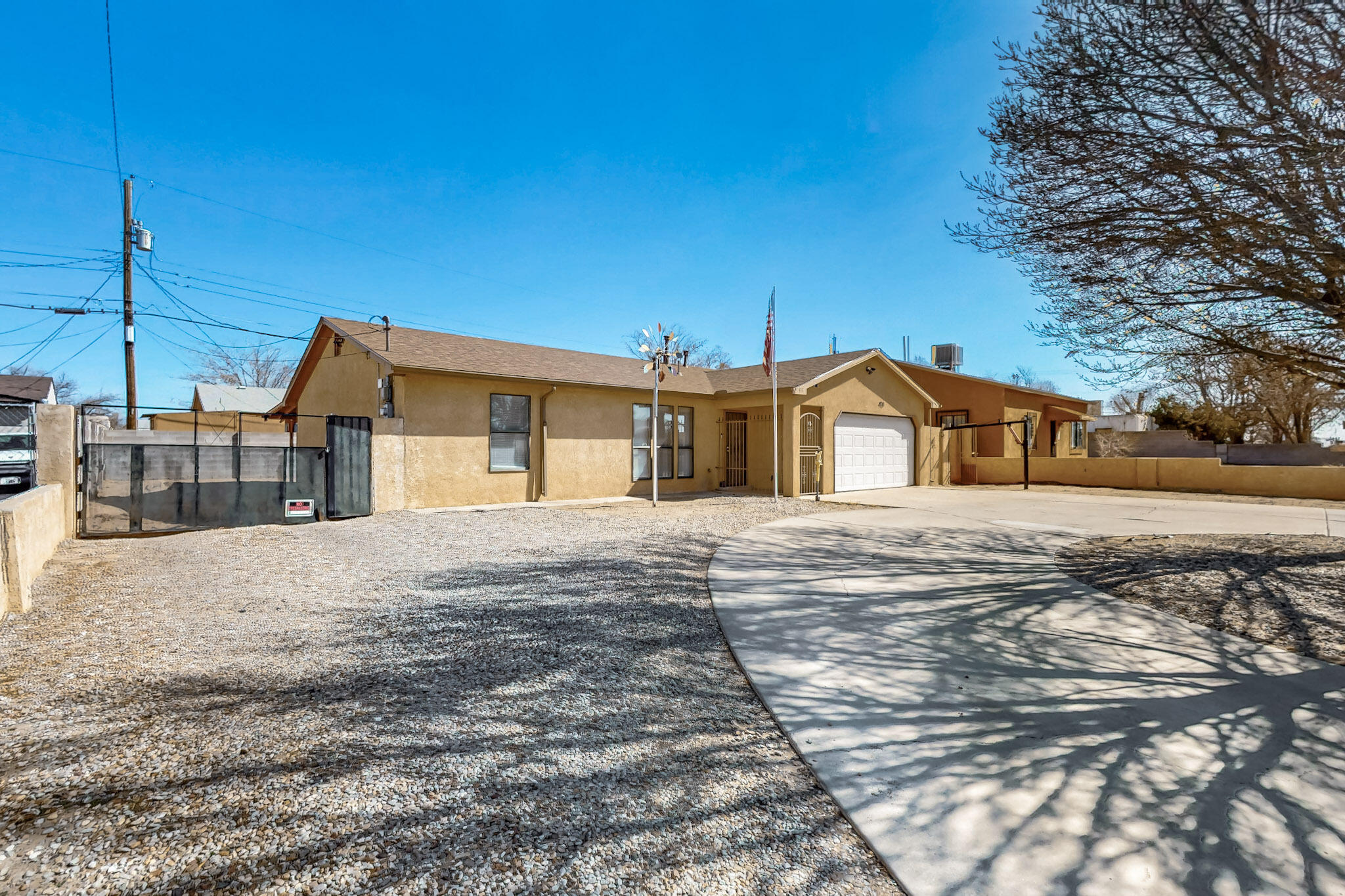 Welcome to this charming home with a host of recent upgrades, making it a true gem! This property boasts a new roof (installed in 2021), new flooring throughout the entire house, and beautifully remodeled bathrooms that offer modern finishes. The home also features a recently installed water heater and a brand-new refrigerated air unit, ensuring comfort year-round. For RV enthusiasts, there's an RV hook-up for added convenience. Backyard acces as well! With its stunning curb appeal, this home is sure to impress. A perfect blend of style and function, it's move-in ready and waiting for you to make it your own!