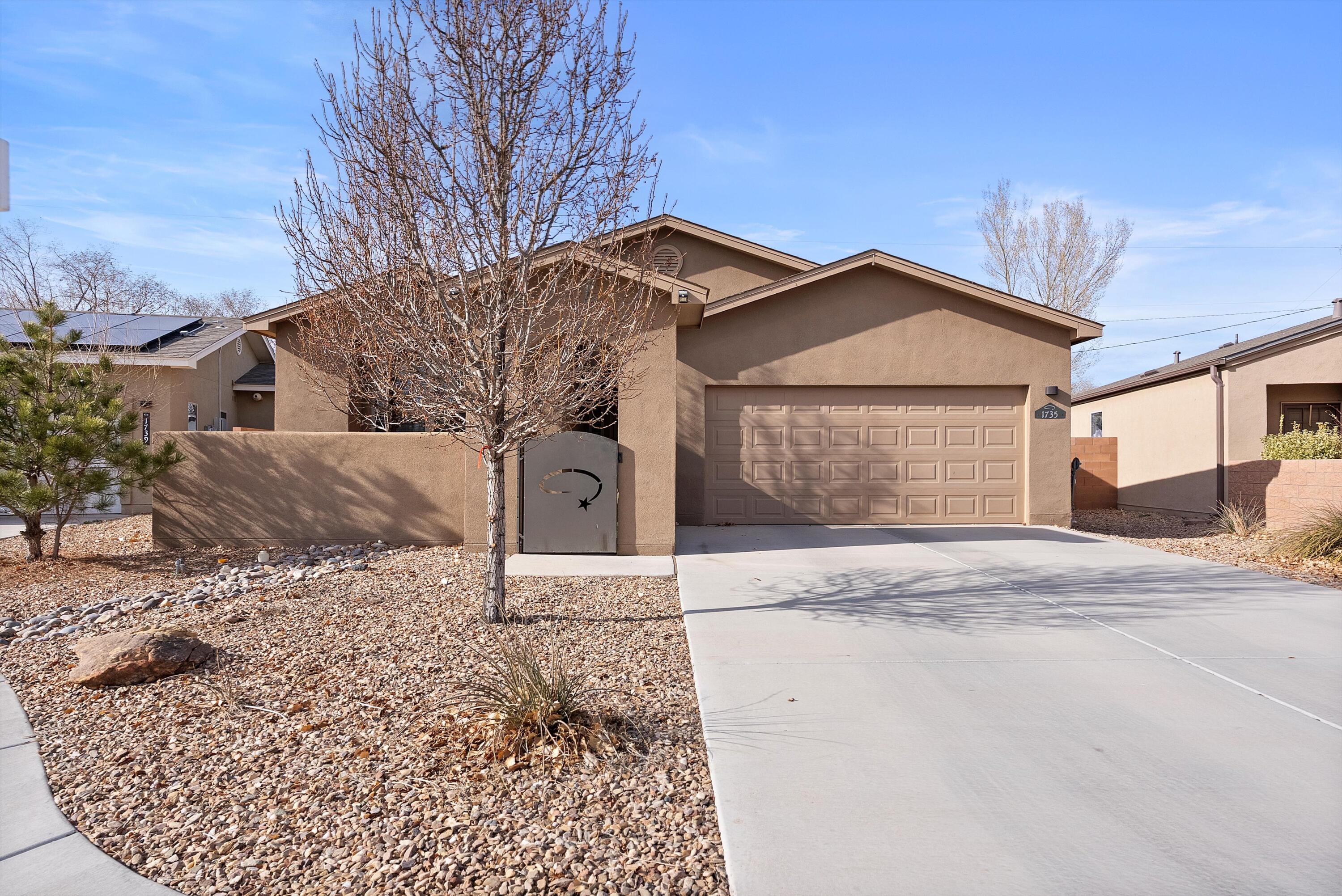 Nestled in a highly sought-after gated community in the heart of Albuquerque, this stunning home offers both luxury and convenience--just minutes from the zoo, aquarium, museums, and more! Step inside to a spacious open floor plan designed for modern living, featuring a generous living area perfect for entertaining. The beautifully appointed kitchen boasts sleek granite countertops and comes fully equipped with top-of-the-line, energy-efficient Samsung stainless steel appliances, including a refrigerator, range, dishwasher, and microwave. A washer and dryer are also included for your convenience. Retreat to the lavish primary suite, where you'll find a spa-like bath complete with a separate shower and soaking tub, dual sinks, and a walk-in closet. Outside, enjoy breathtaking views from the