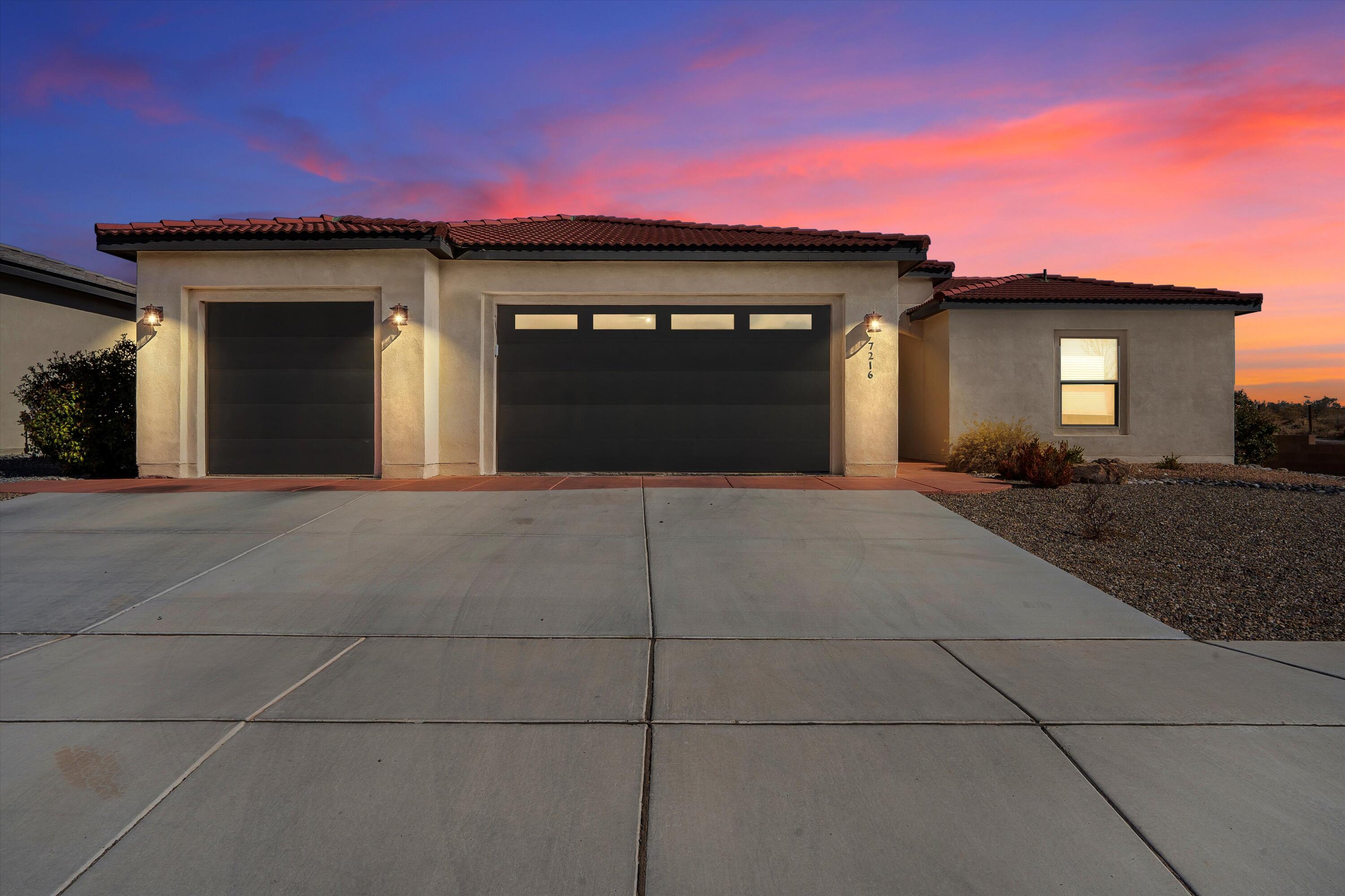 Stunning former Model Home with Premium Upgrades & Breathtaking Sandia Mountain Views! Welcome to this gorgeous 4-bed, 3-bath home in the desired Lomas Encantadas subdivision of Rio Rancho. With an unparalleled blend of luxury and comfort. Prepare to be captivated by the open-concept design, high-end finishes, and versatile floor plan that includes a formal dining room or office space--perfect for entertaining or working from home. The gourmet kitchen is a chef's dream, featuring premium quartz countertops, custom cabinetry, and stainless-steel appliances, overlooking the light-filled great room with elegant designer touches throughout.