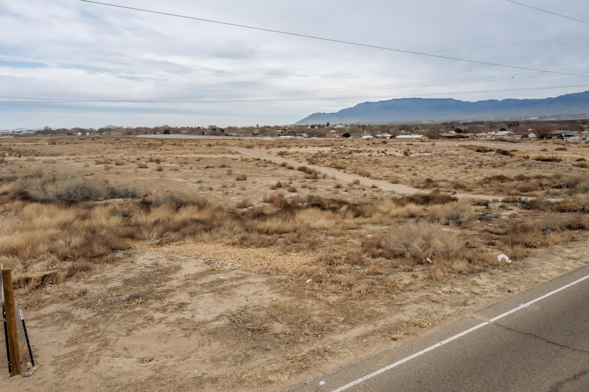 Prime 5-Acre Investment Opportunity - Endless Potential! Discover an incredible opportunity to own 5 acres of mostly level land with breathtaking views and unlimited possibilities. Situated in a growing area, this prime parcel offers the perfect setting for your dream home, a multi-lot subdivision, or a long-term investment. Ideal county location: Conveniently positioned on a paved road with utilities nearby, making development easier. Bordered by Mead Ave to the south, homes along Mead St to the west, Barbara Vista Ave to the north, and Amole Arroyo Trail to the east. Just one mile from Wal-Mart and close to shopping, dining, and services. This is a rare chance to invest in a sought-after area with future growth potential. Buyer to verify subdivision and utility details. Call for tour!