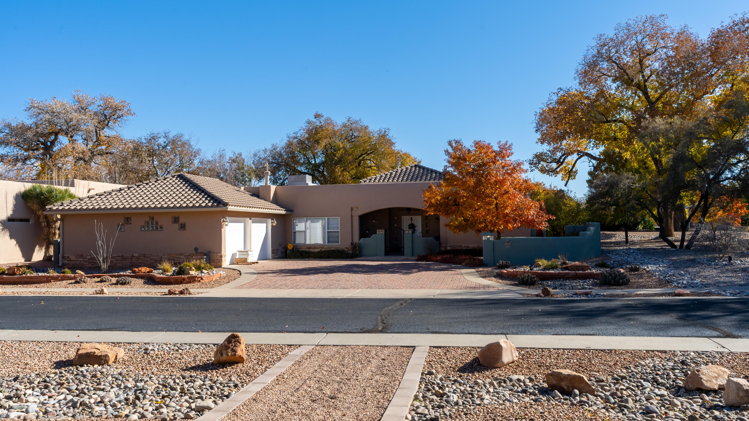 Incredible single story home located in one of Albuquerque's hidden gem neighborhoods. This exceptional single story home offers four bedrooms, three bathrooms, great room with gas fireplace, formal dining room, breakfast nook and fully landscaped front/backyards. Paved driveway, walled front courtyard with wrought iron gate, two refrigerated A/C units, boiler system, holding tank and one water softener, TPO roof, renovated primary bathroom with separate shower, Kohler walk-in bathtub, double vanity, and extended backyard patio are some of the updates completed by current homeowners. Enjoy this park like community only minutes from Albuquerque Old Town, restaurants, museums, bike path, bio-park and much, much more.