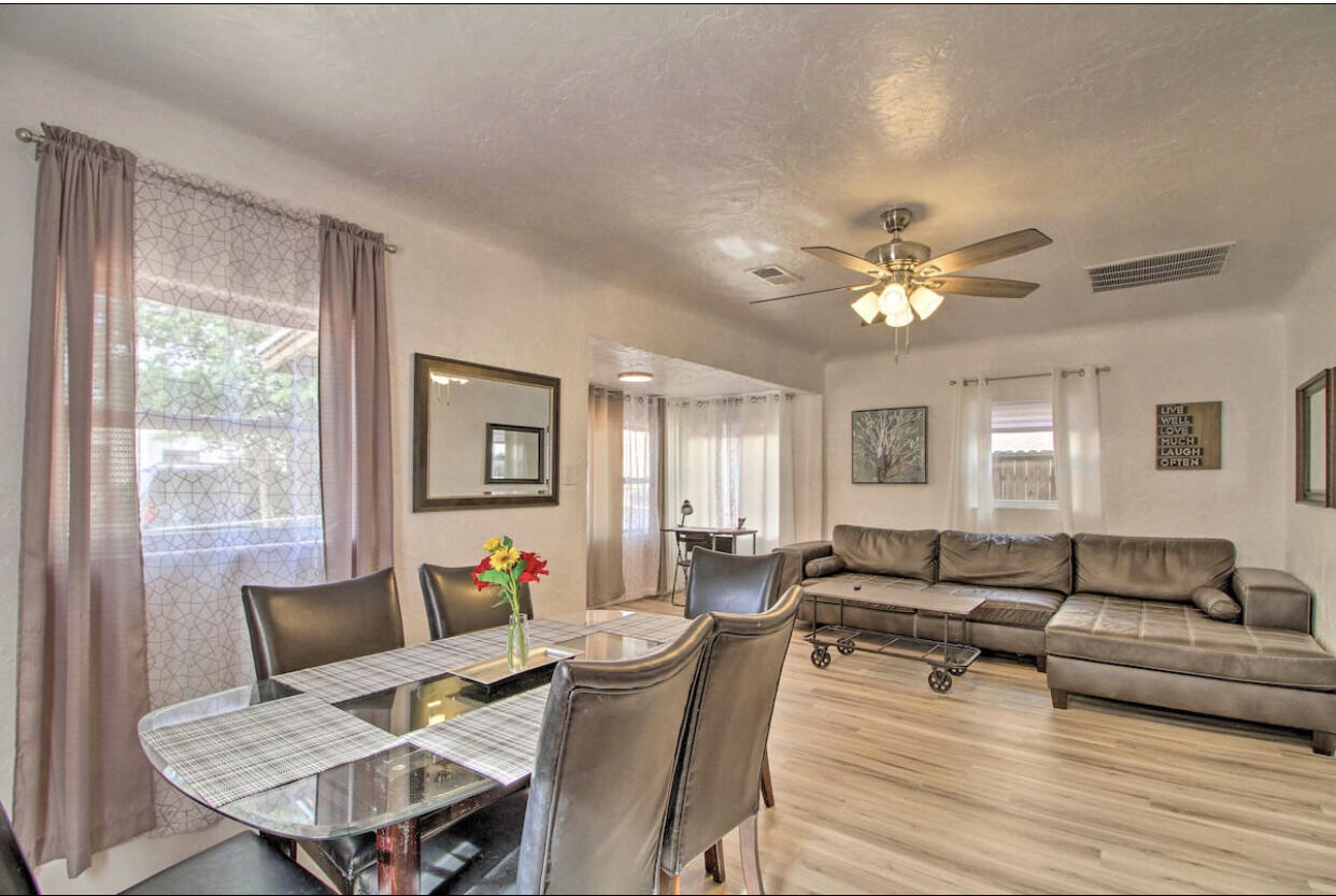 Charming multi-family property perfect for investors or multi-gen living. Remodeled and fully furnished, this turnkey-ready gem includes a spacious 3BR/1.5BA unit and a cozy 1BR/1BA unit--both move-in ready! Great rental or short-term income potential near downtown ABQ. Live in one unit and rent the other, or maximize returns with both. Owner financing available with substantial down payment, adding flexibility to your investment. Updated, furnished, and income-ready--this property checks all the boxes!