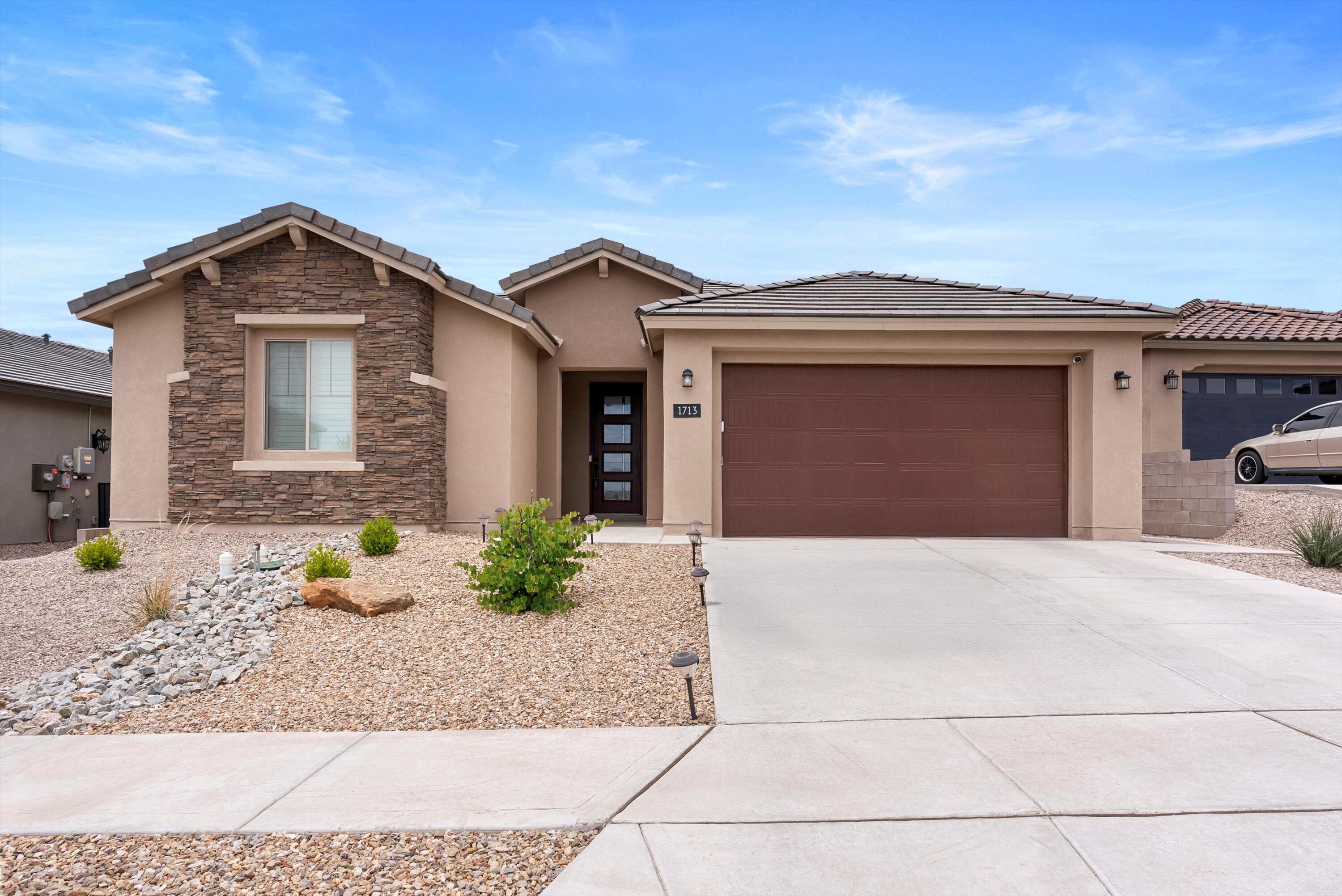 Eligible for Special Interest Rate! Luxury is within reach in this pristine single-story Pulte Parklane home in gated Inspiration. This no-shoes home features an open layout with a spacious great room, dining area, and chef's kitchen--complete with granite island, sleek white cabinets, walk-in pantry, and a never-used oven. Enjoy luxury vinyl and tile floors--no carpet! The primary suite offers a walk-in tiled shower, seated vanity, and large closet. A private guest suite with 3/4 bath, two more bedrooms, and a flex space provide versatility. Custom plantation shutters and electric hideaway blinds add style. Relax on the covered patio in a landscaped backyard with no rear neighbor and stunning city and valley views. Energy-efficient green-build.