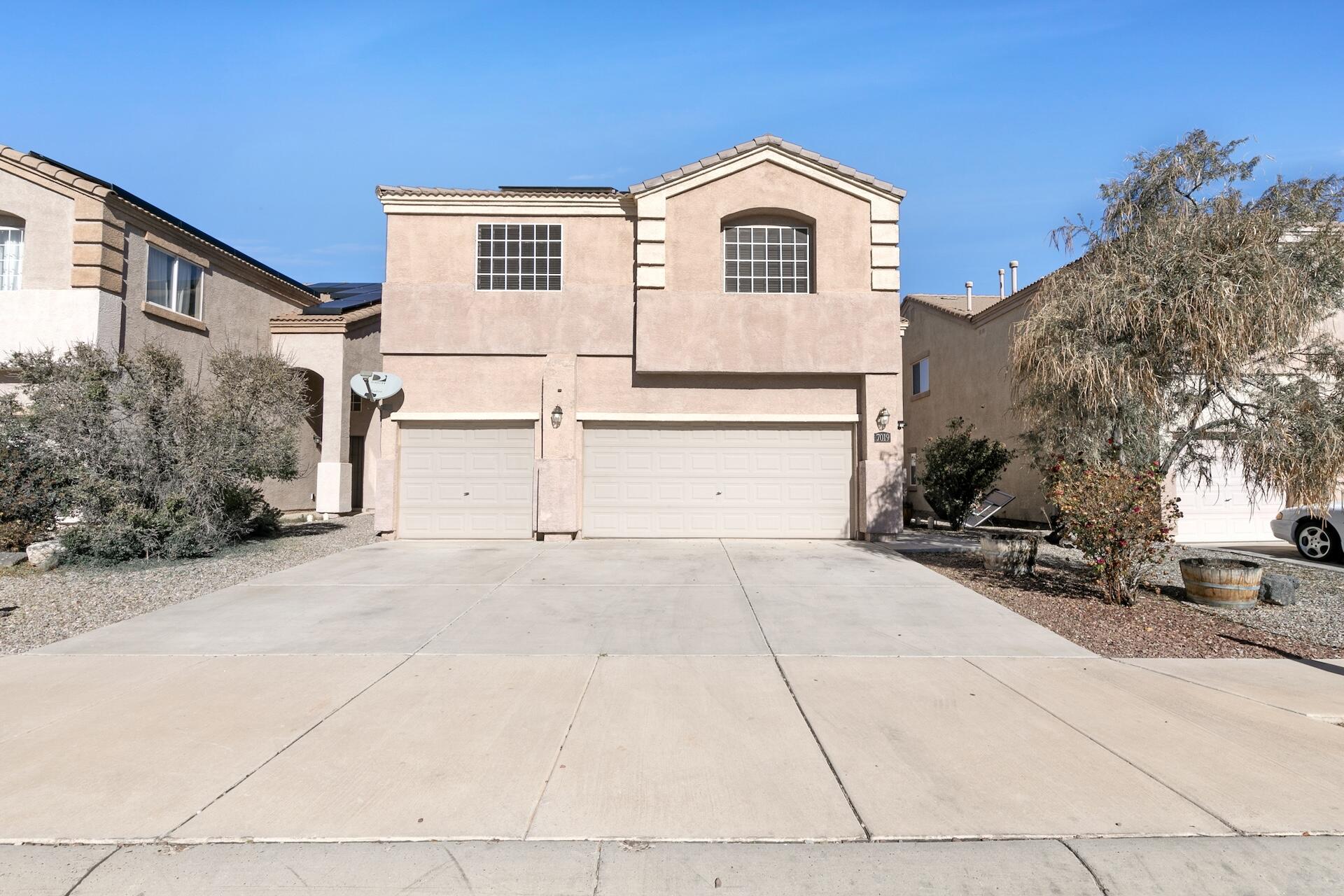 **Seller is offering a carpet allowance with an acceptable offer** This large well kept 5 bedroom home is ready for new owners! Spacious bedrooms and 3 full bathrooms plus a downstairs bedroom with nearby 3/4 bath. Fully paid for solar panels with an 8 year warranty remaining which are estimated to produce an average of 13,000 kWh per year leading to a very low, if any at all, electricity bill! New tile floors in most of the main level areas with an open floor plan perfect for entertaining your friends and family. Did I mention this home offers plenty of storage space and a 3 car garage? The entire back yard has block wall privacy fencing and is landscaped. Easy access to shopping, schools, and plenty more. There are two AC/Furnace units and the roof is concrete tile.