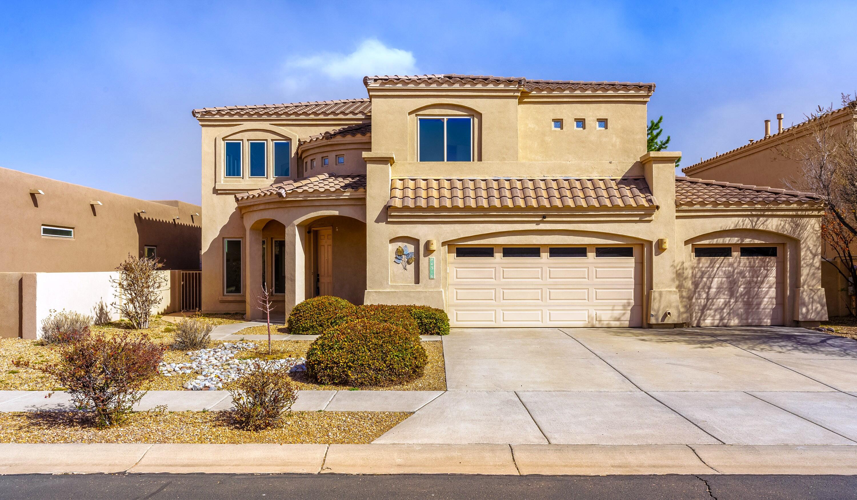 Highly coveted 5-bed 3-bath home located in the gated community of Oxbow North. Sitting above the Rio Grande, this home of over 3,000 sq. ft is in an ideal location with convenient access to I-40 and next to St. Pius collegiate school. Enjoy stunning views of the Sandia Mountains from the upper balcony. This home's spacious and bright floor plan with high-rise ceilings, features a large kitchen, huge family room with a custom fireplace. Guest-suite is located on the main level. Elegant French Door entry into the master suite with walk-in closet and a private balcony. Backyard has high walls for privacy. A must see! Nearby restaurants / shopping (Chick-Fil-A, Panera Bread, Starbucks, Wecks, Jinja, Dions, Sprouts, Petsmart, Albertsons) and Flix Brewhouse.