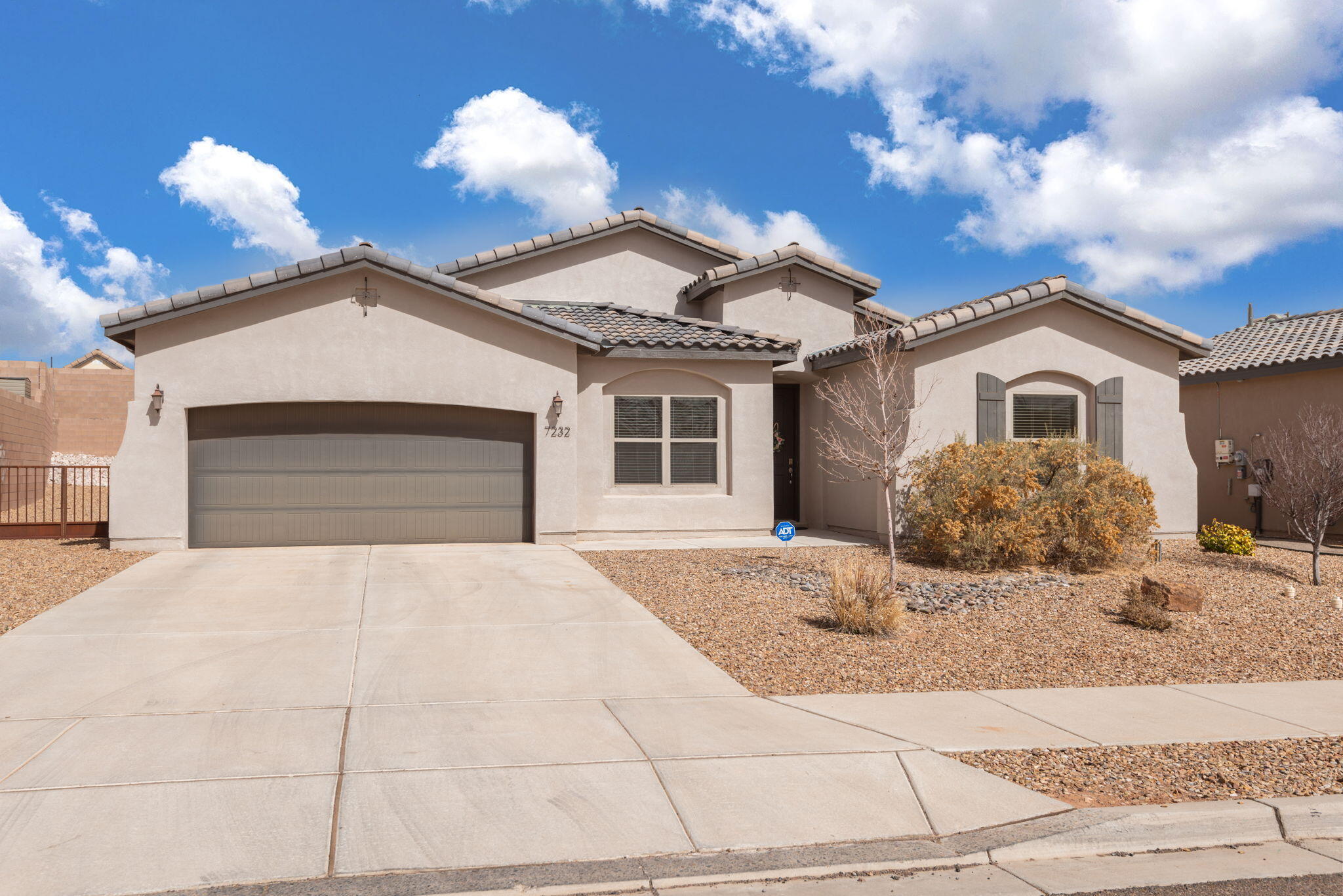 OPEN HOUSE - SAT 3/15 from 10-12!!  Welcome to the sought-after Enchanted Hills community which offers the perfect blend of style, comfort, and convenience.  This single story, light-filled, open-concept layout features modern finishes throughout. The kitchen boasts ample counter space w/ stylish backsplash, quartz countertops, a spacious pantry, & stainless steel appliances. The primary suite includes an ensuite bath with dual sinks, & a walk-through closet leading to the laundry room. Cool refrigerated air, tankless water heater & ceiling fans throughout! Step outside to a newly landscaped backyard--perfect for BBQs, morning coffee, or relaxing in your private oasis. Conveniently located minutes from Sprouts, shopping, restaurants, breweries, and The Block!  Schedule your showing today