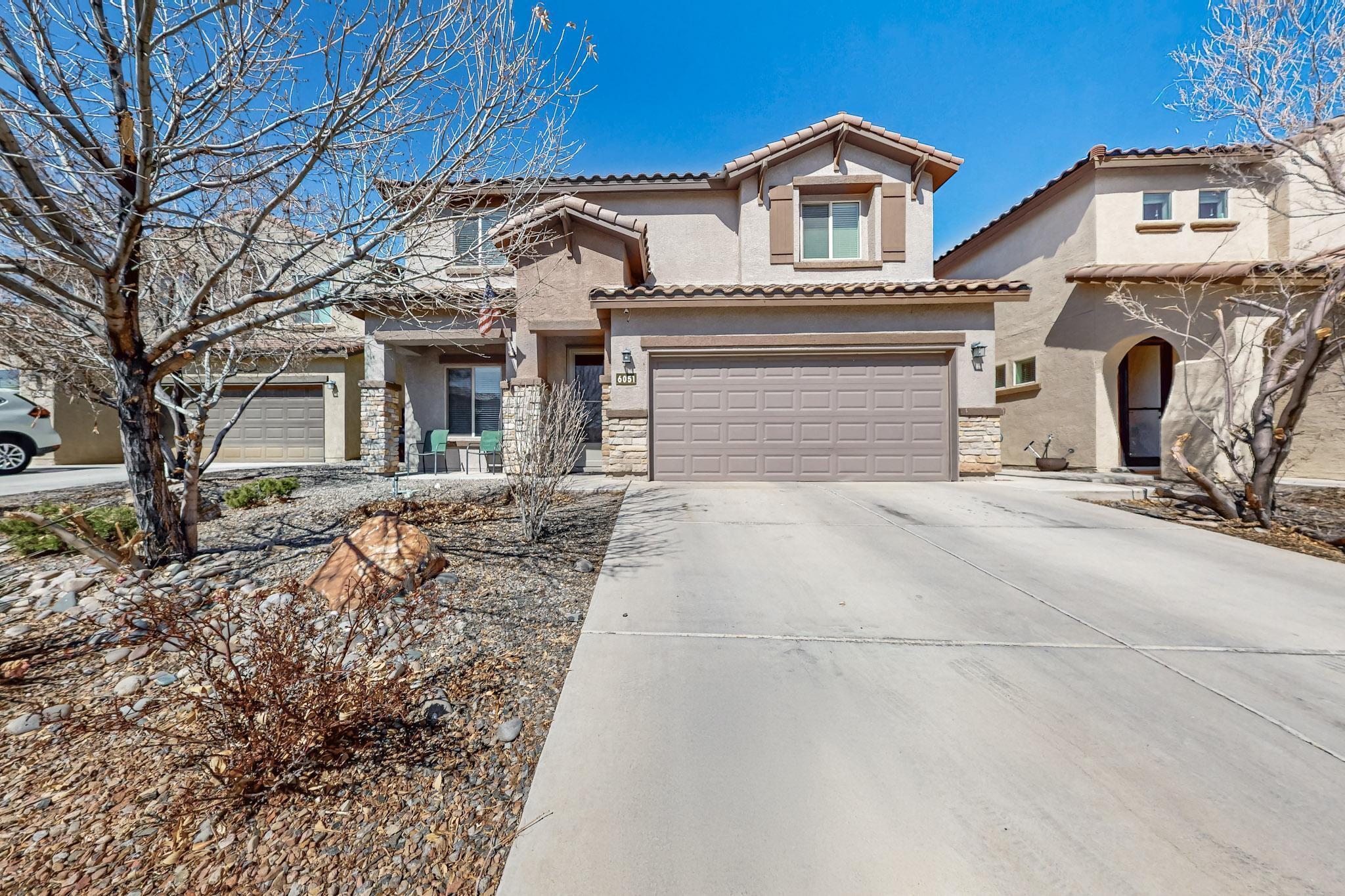 Welcome to 6051 Geode Rd NW, a stunning 5-bedroom, 3-bath home in Albuquerque, NM. Built in 2017, this 2,397 sq ft residence features an open-concept layout, a gourmet kitchen with granite countertops and stainless steel appliances, and a spacious master suite with an en-suite bath. Modern finishes and energy-efficient features enhance its appeal. The low-maintenance backyard is perfect for relaxation. Located in a family-friendly neighborhood, it's close to schools, parks, shopping, and dining, with easy highway access. Don't miss this beautiful home!