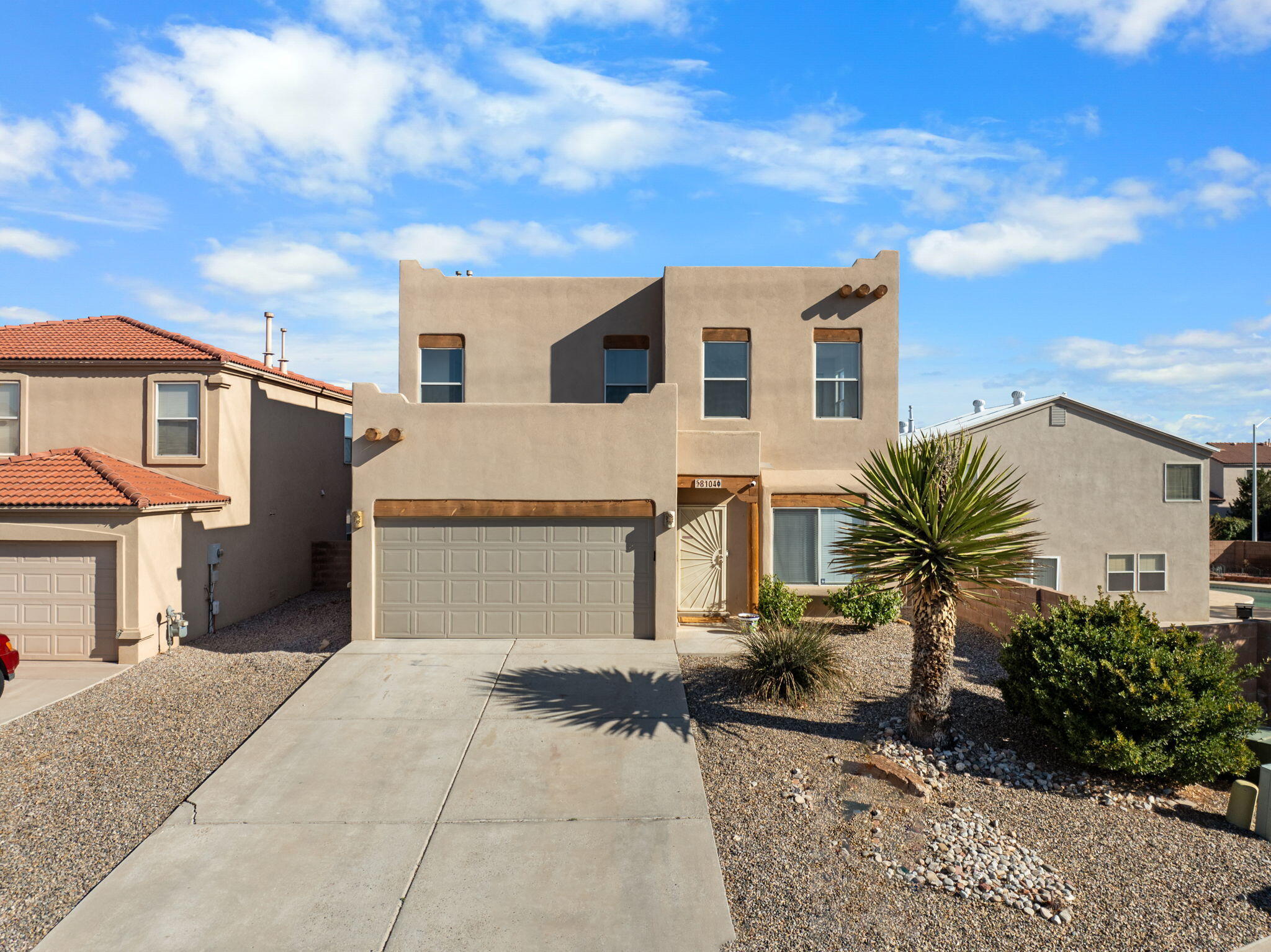 Welcome to this completely renovated 5 bd home with mountain views! Step into a bright kitchen boasting NEW Whirlpool appliances, quartz countertops, modern fixtures & chic backsplash. The kitchen flows into a spacious living room featuring NEW 12 mil vinyl plank flooring & contemporary fireplace. Outside is a landscaped yard with VIEWS, pergola, kids house & BONUS fenced area. The main floor master suite is generously sized & features a beautifully renovated bathroom. Upstairs are 4 LARGE bedrooms perfect for multi-generational families, or those who need the extra space. The hall bathroom completes the home with fresh tile, oversized tub & updated vanity. Ideally located with direct access to Paseo & within the school districts of Petroglyph & Volcano Vista. Schedule your showing today!