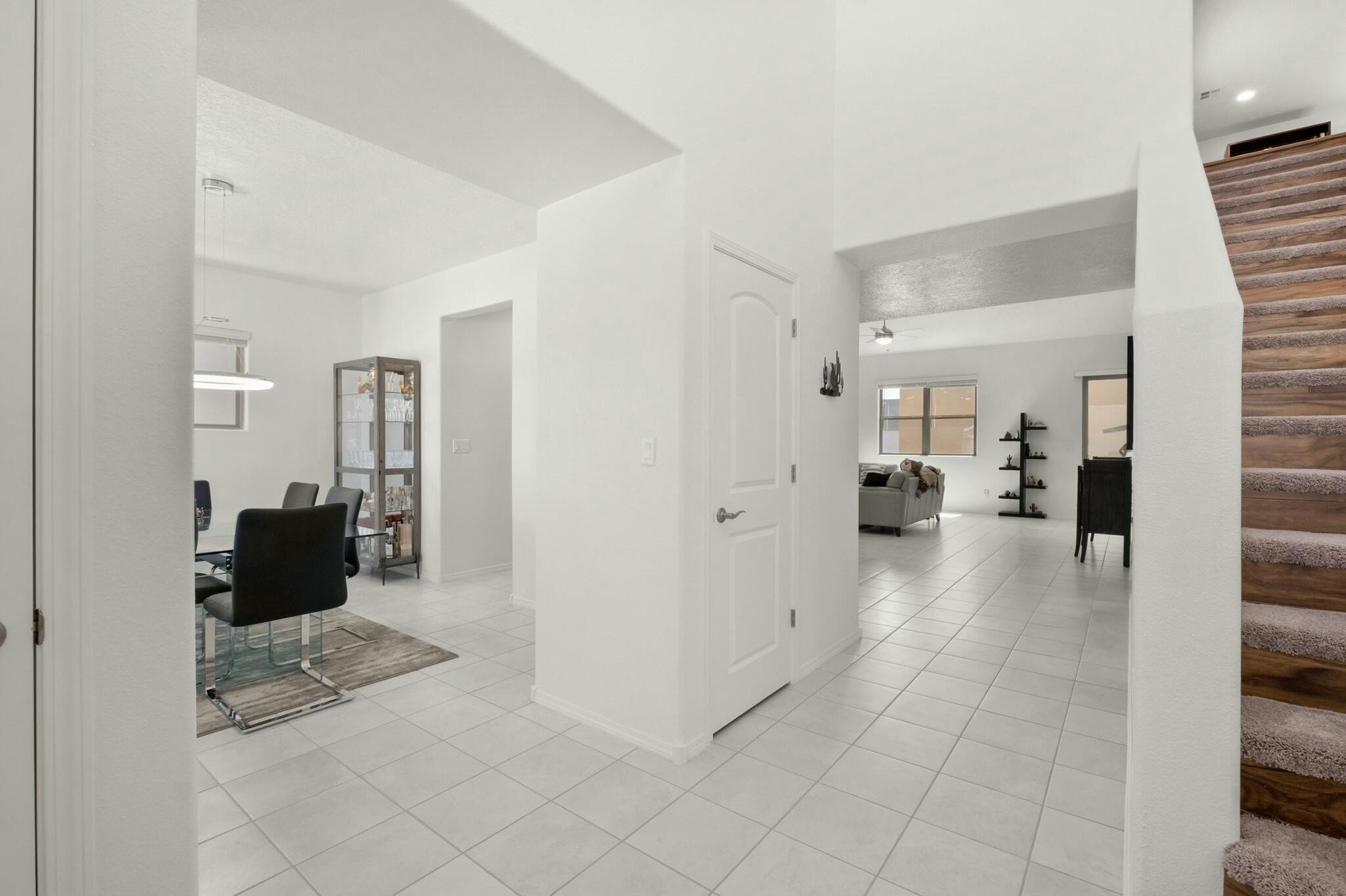 Experience modern luxury in this stunning 2023 Stout floorplan by Abrazo Homes, located in Mesa del Sol, Albuquerque. This spacious 4-bed, 4-bath, 3,096 sqft home includes a private casita for added versatility. The gourmet kitchen impresses with a built-in oven & microwave, 5-burner cooktop, SS appliances, granite counters, glass tile backsplash, and elegant glass-insert 42'' uppers. Enjoy instant hot water, garage with epoxy finish, over head storage, a landscaped backyard with irrigation, and breathtaking Sandia Mountain views from the deck. A must-see gem in a thriving community!