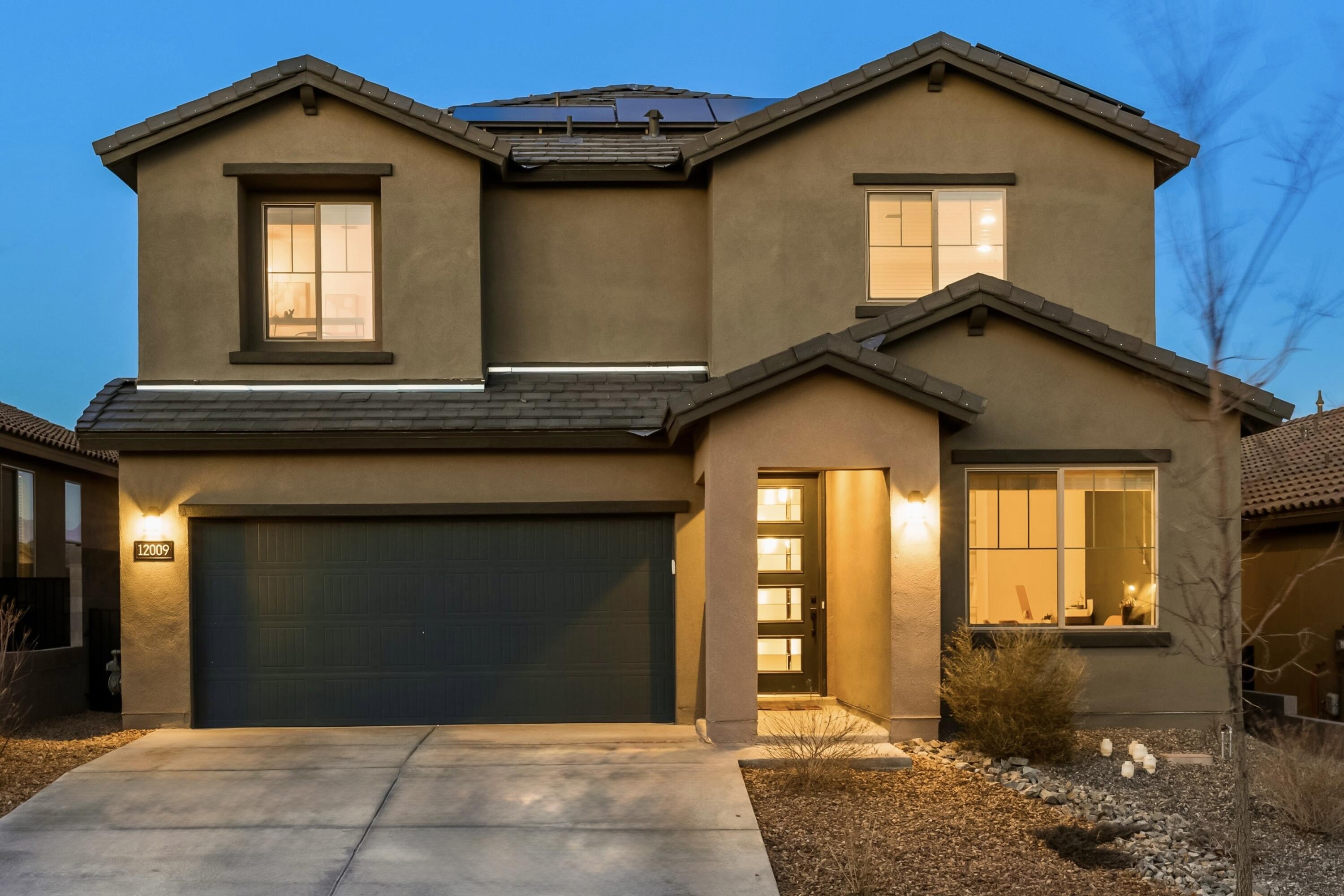 This open concept home, with its elegant upgrades and impeccable taste, offers three bedrooms plus an office or optional fourth bedroom. Including PAID OFF SOLAR. The heart of the home features a spacious great room flooded with natural light that flows effortlessly onto a generous pergola-covered patio. The kitchen is a dream featuring stainless steel appliances, an oversized island with quartz counters, and a layout perfect for entertaining. Nearly every finish was upgraded; wood-look tile flooring, high end light fixtures, matte black hardware & plumbing fixtures, custom accent walls, premium garage floor coating, & more! Upstairs the expansive primary boasts mountain views and a luxurious en suite bath with walk-in closet, double vanity, rain head in shower, and bench. Two additional