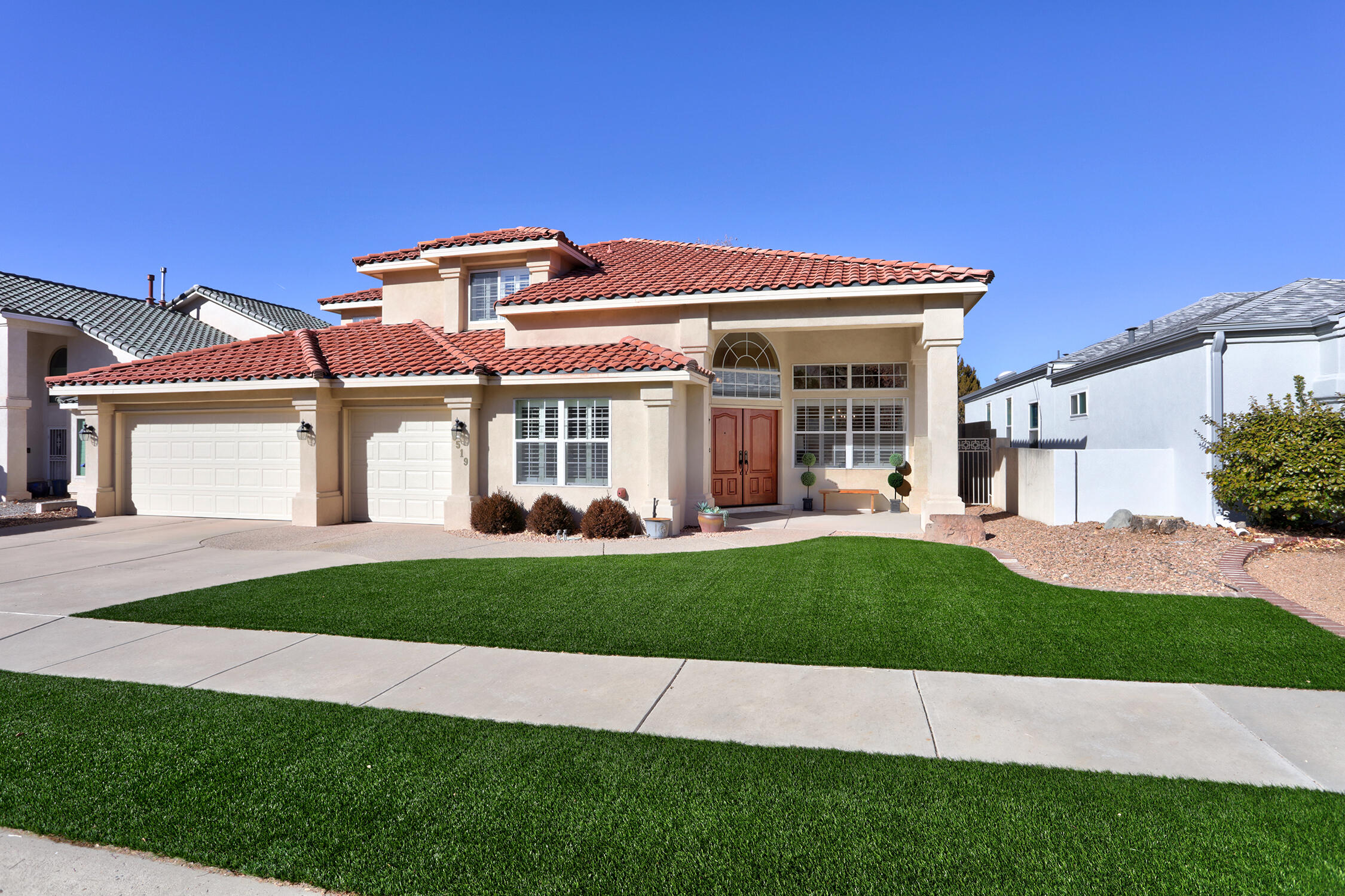 GREAT NEW PRICE! This elegant 2-story home, crafted by Mechenbier and nestled in the coveted Winridge subdivision.  With 4 generously sized bedrooms and the potential for a 5th in the office area, this home offers great living space.  The kitchen is a true highlight, featuring a large granite island/bar, breakfast nook, walk-in pantry, designer tile backsplash, and top-tier appliances including a Dacor 5-burner gas stove & a sleek Ventahood. The breakfast area overlooks the serene backyard, providing a peaceful setting for morning meals. The main floor showcases a luxurious primary suite with private sliding doors leading to an outdoor retreat complete with a hot tub & outdoor fireplace.  The yards are low maintenance and easy care.  A home generator is on south side of house.