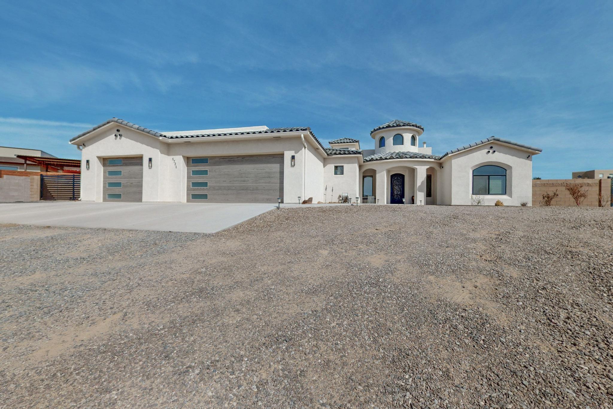 Pre listing appraisal came in at 845K! instant equity! Pride of ownership shines in this stunning Crescent Custom Home! From the moment you step inside, you'll be captivated by the seamless flow of the open concept kitchen, great room and dining area-perfect for entertaining or enjoying everyday luxury. The chef's kitchen is a showstopper, boasting a massive island, abundant storage and a spacious butler's pantry. The ultra large primary suite is a true retreat with a spa like bath, walk in shower, separate garden tub and an expansive layout designed for comfort. Car enthusiasts will love the oversized 1,380 sq. ft. 3 car garage with extra storage and backyard access for RVs and toys. Step onto the enormous covered patio and take in breathtaking Sandia Mountain views.