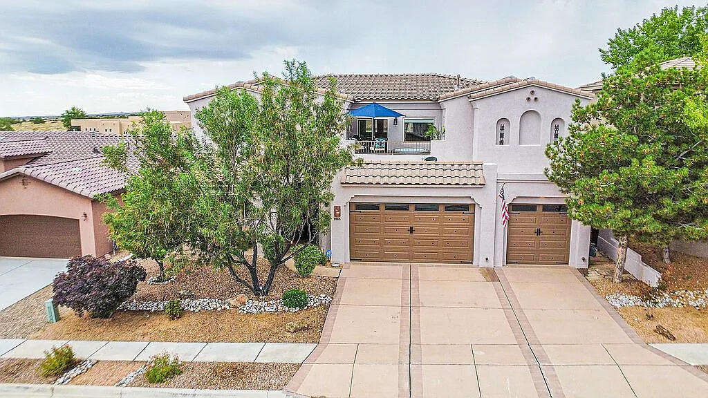 Multi-gen, custom home in Mariposa with views!  Assumable 5.875% fixed until 2030.  This gorgeous, quality Mediterranean home is the perfect combination of high-end elegance and low maintenance, on an arroyo backing lot with gorgeous Sandia mountain, Albuquerque city lights and arroyo views!  Mariposa is a highly sought after community in one of New Mexico's top school districts with an incredibly low crime rate, 25 minutes to ABQ and 45 minutes to Santa Fe.  Included in the HOA is a gym, indoor and outdoor pools, and gorgeous walking/biking trails!