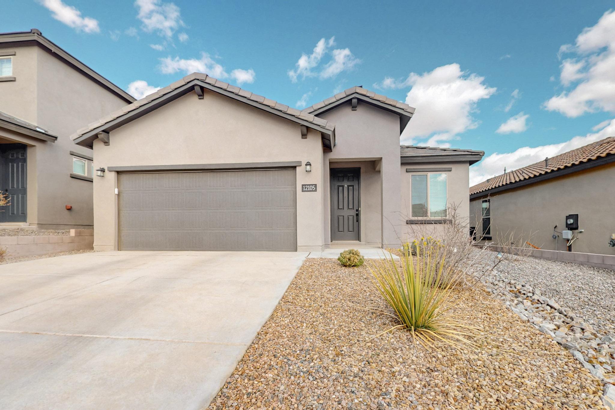 Welcome to the desirable Inspiration Gated Community in West Albuquerque! Special Opportunity Zone= lower interest rate available on this home!!This prime location offers easy access to I-40, Kirtland Air Force Base, Sandia Labs, Nusenda Community Stadium, and much more. Love golf, gaming, dining, or outdoor fun? You're covered! This nearly new Pulte Hewitt Model is a bright, open-concept, single-level home with a flexible 3-bed, 1.75-bath layout plus a spacious study. Enjoy low-maintenance xeriscaped yards with drip irrigation. The stylish kitchen boasts maple cabinets, roll-out shelving, stainless steel appliances, and quartz countertops. Certified Build Green NM Bronze for energy efficiency. Don't miss the private park and the perks of this exclusive community--make it yours today!