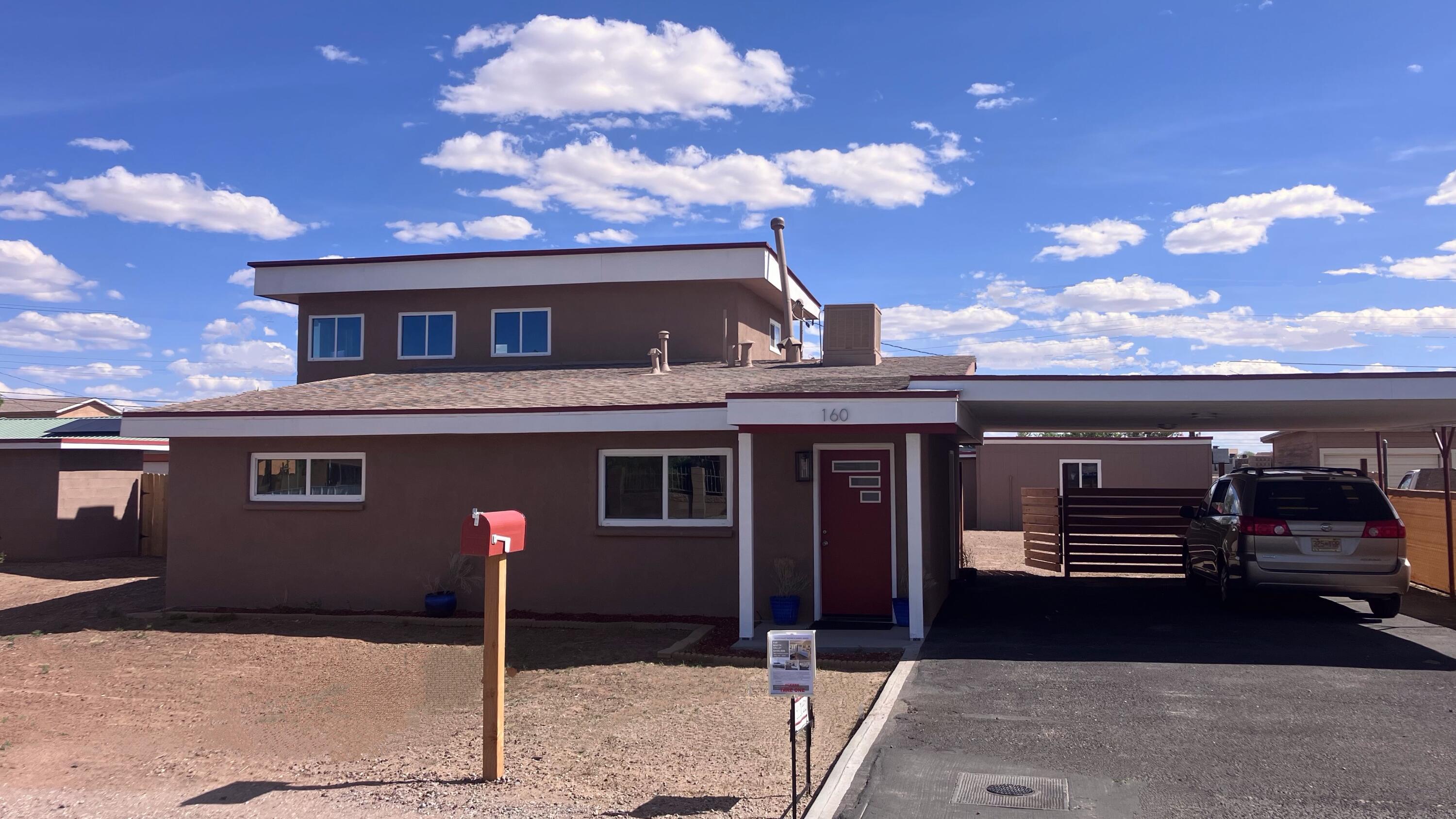 Affordable N Valley living. Clean, fresh, and brand new inside! The entire top floor is a bright and airy primary suite with walk-in closet. See Sandia Peak from your bed- really. Near SteelBender Brewery and 1/2 block from Los Ranchos bike trails. Granite and gleaming white in the kitchen. Big fireplace and double doors in the den. Large 0.25+/- acre has a 2 room workshop, pump house, and double wide gates w room for your RV and all the toys. Zoned to build a casita when you want. Rarely is this area on the market so start your summer here.
