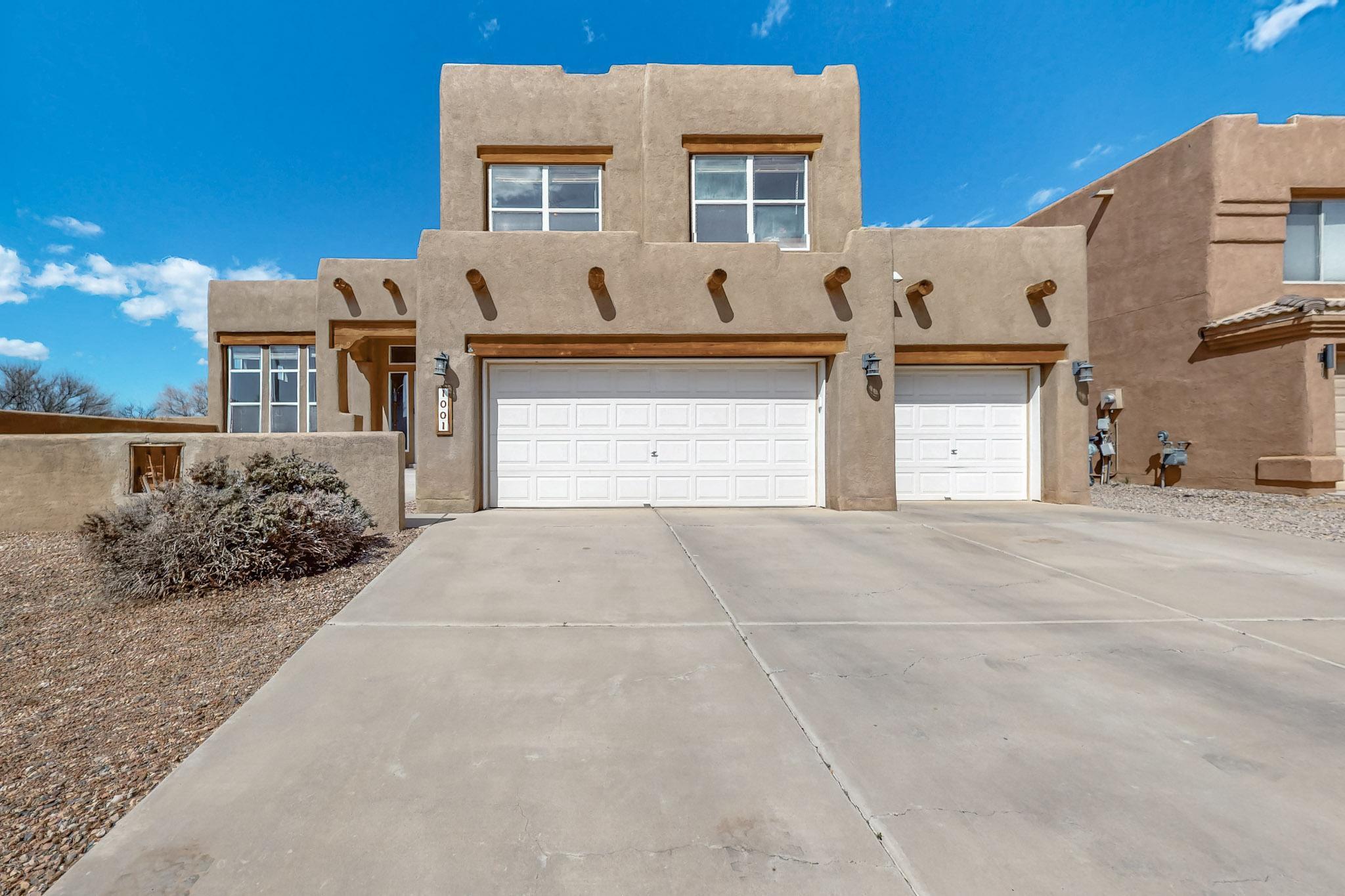 Discover this stunning Pueblo-style home in the highly sought-after Vista Del Norte community--available with an **assumable VA loan at just 3.625%!** Situated on a prime corner lot, this former model home features an open floor plan, wood floors, and a dedicated office space. The gourmet kitchen with a breakfast bar flows seamlessly into the sunken living area, perfect for entertaining. The beautifully landscaped backyard is an entertainer's dream, complete with a covered patio, custom barbecue grill, and an in-ground jacuzzi. Additional highlights include a three-car garage, dog run, and easy access to scenic trails, parks, and top dining spots. Located just minutes from I-25 and Balloon Fiesta Park, this home is a rare find--schedule your showing today!