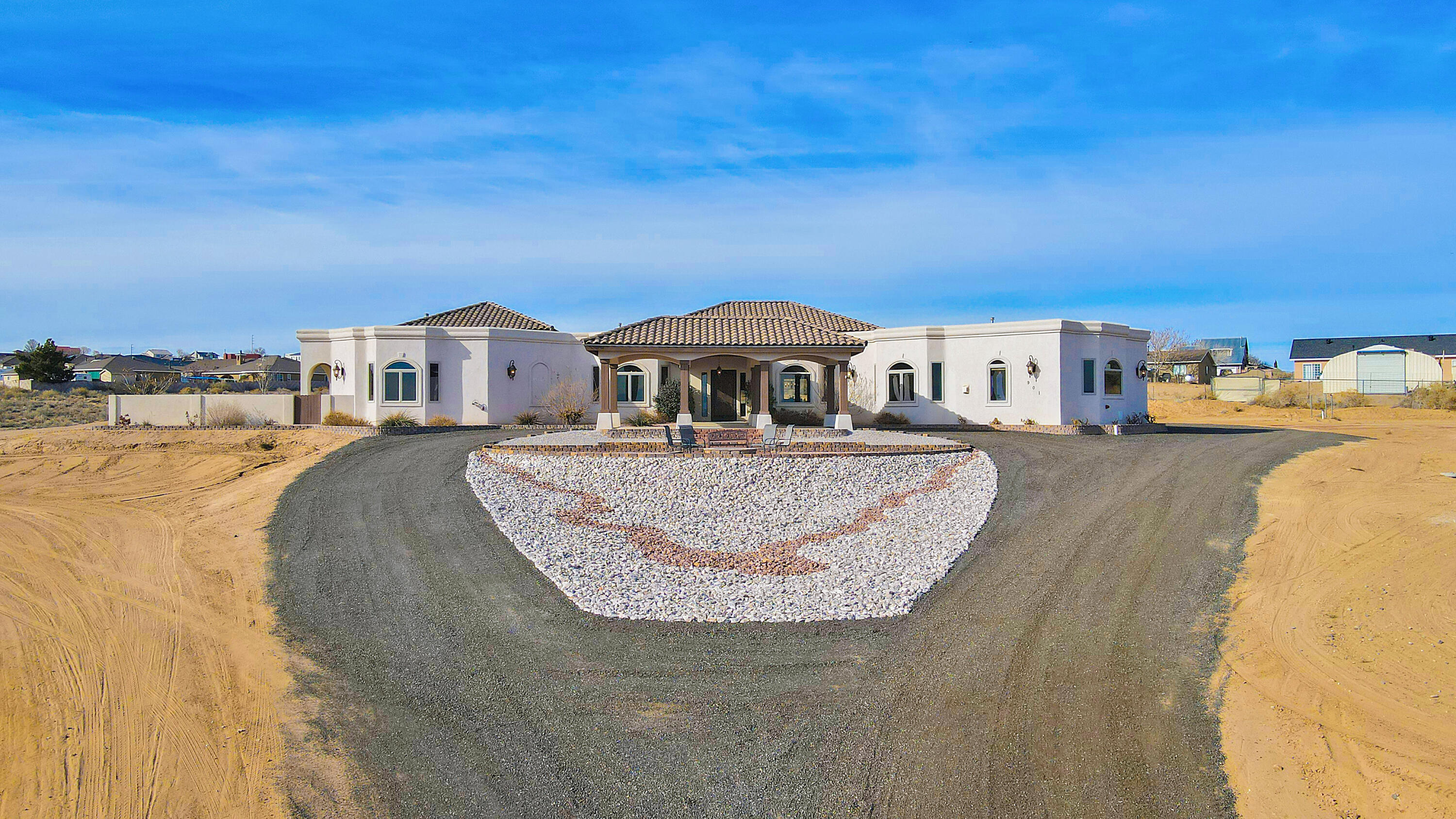 Luxurious home built for family fun or fabulous entertaining.  Lovely, peaceful view of entire city night lights, plus perfect for balloon watching or spectacular 4th of July fireworks displays through-out city.  Sits on 2.7 acres, oversized 3 car garage (1288 sq. ft.), with extra length for those longer vehicles. Open kitchen, Cabinet-front sub-zero refrigerator and appliances, wine cooler, Wolfe 6 burner range with 2 ovens plus 3rd wall oven and huge hidden pantry with extra room for 2nd freezer/refrigerator.  Its family time in game room with bar and fireplace plus this room adjoins the media room. Elegant/spacious primary bedroom with incredible jetted 2 person tub and 2 person shower. Fully landscaped  backyard sporting two covered patios plus open patio for watching night lights.