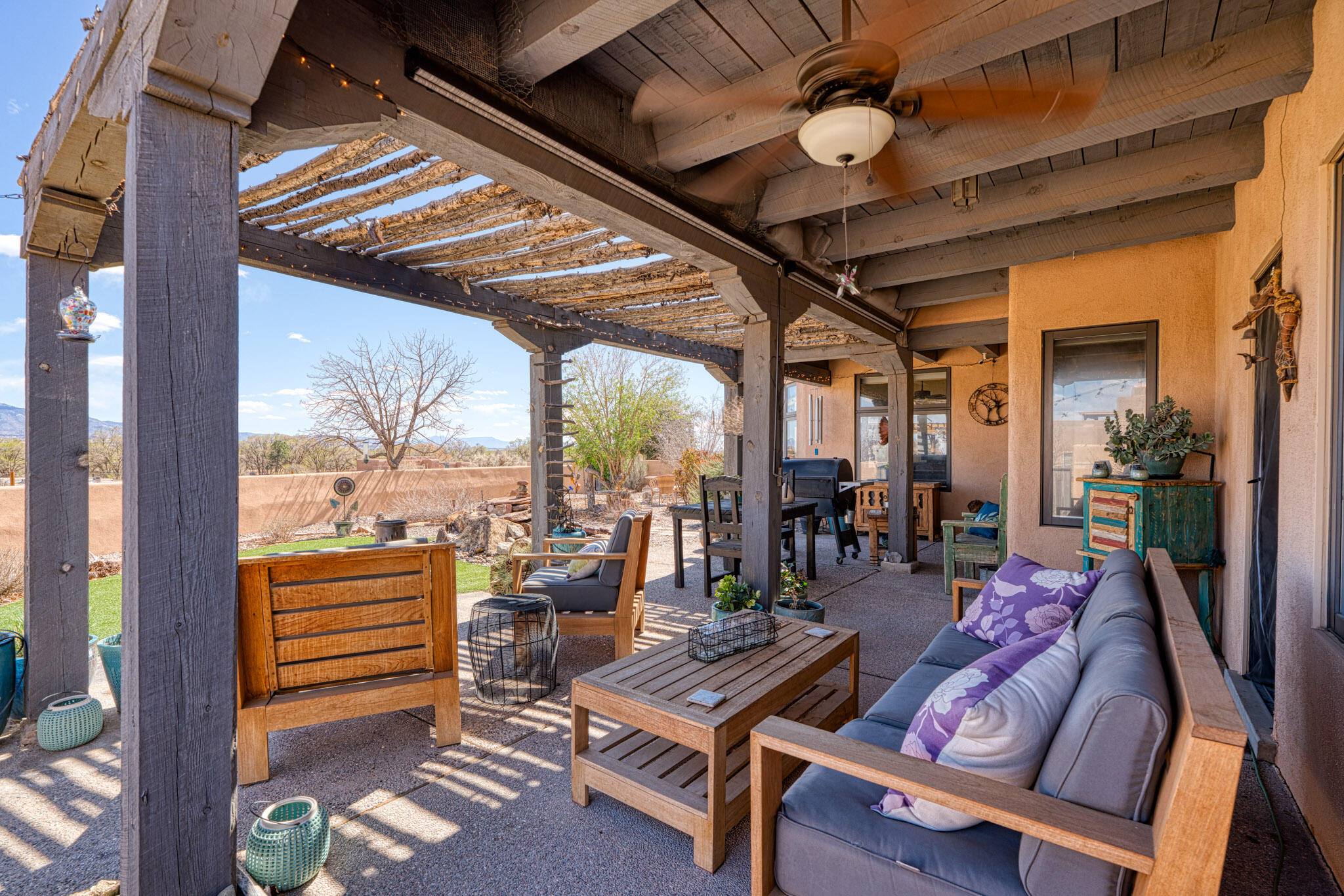 Breathtaking 180-degree views of the Sandia Mountains with brilliant sunrises, captivating sunsets, bright moon risings. Immaculate condition - pride of ownership! Exposed beam ceilings, high-end finishes. A spacious private wing Owner's Suite, traditional Kiva fireplace, spa bath, walk in closet and office. Dream Chef's kitchen and large pantry. East wall of view windows; view laden, serene east yard with fountain, pergola, privacy wall and inviting landscaping. Coveted South Village of Corrales ''in town country' location provides quick access to Cottonwood Mall, local pubs, dining, historic sites, trails, acequias, greenbelt, airport, downtown, AF Base. Corrales is a 'safest city' and 'horse capital' of New Mexico.