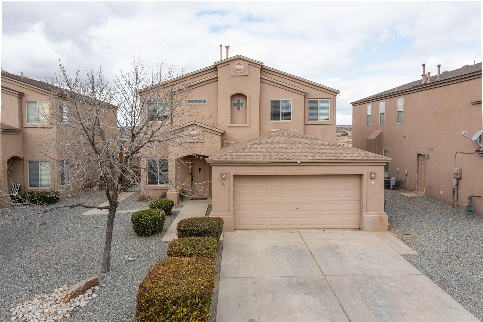 This lovely home in the Northern Meadows Neighborhood of Rio Rancho will impress the new buyers. Downstairs you'll find two living areas, one with a fireplace. There is also an office and dining area. The large kitchen is a chef's dream with stainless steel appliances, beautiful countertops and fresh paint. Retreat upstairs and you'll find three large  secondary bedrooms and a generously sized primary suite with its own primary bath with garden tub and walk in shower. There is also a large primary walk in closet. Outside through the sliding glass door is good sized private backyard with shed. The neighborhood has numerous parks for both people and pets!