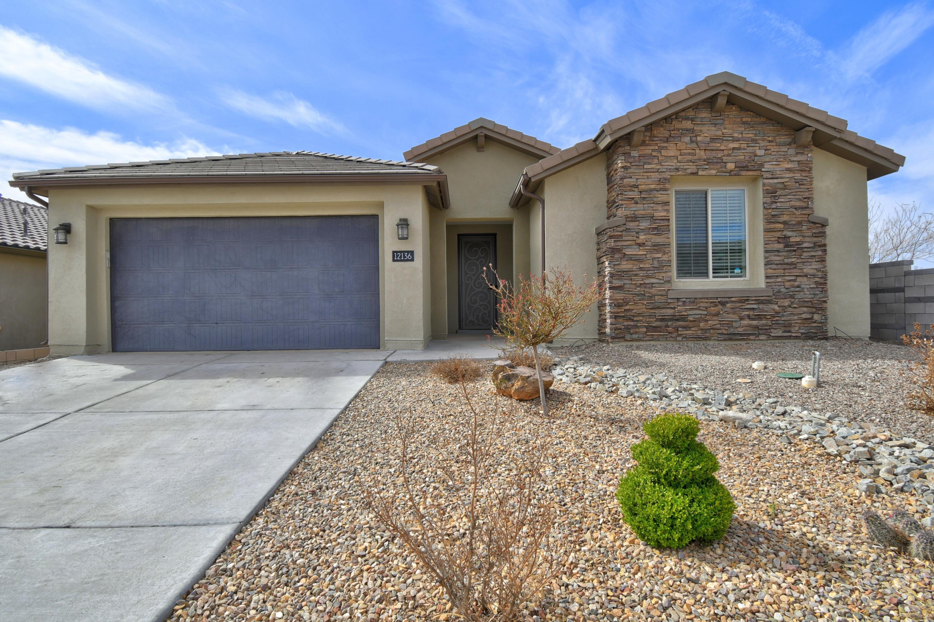 Stunning home in the gated Inspiration community, boasting countless upgrades and an exceptional open-concept design!  Built by Pulte Homes, this 4-bedroom plus study home features a gourmet kitchen with stainless steel appliances, a massive 10-ft. island, large pantry, and ample cabinet space. The spacious living, kitchen, and dining areas flow seamlessly, enhanced by a cozy gas fireplace, perfect for entertaining. All bedrooms offer walk-in closets, while the primary suite includes a spa-like shower. Additional highlights: 8-ft. doors, granite countertops, a custom security door, and silver-rated energy certification with instant hot water and a tankless water heater. Nestled on a corner lot, this home is truly the perfect place to hang your heart with tons of natural light!