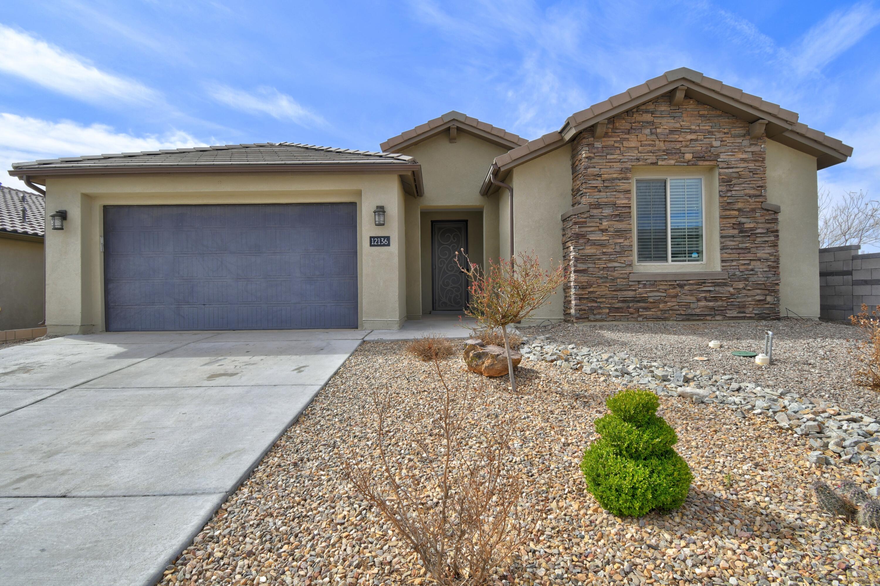 Stunning home in the gated Inspiration community, boasting countless upgrades and an exceptional open-concept design!  Built by Pulte Homes, this 4-bedroom plus study home features a gourmet kitchen with stainless steel appliances, a massive 10-ft. island, large pantry, and ample cabinet space. The spacious living, kitchen, and dining areas flow seamlessly, enhanced by a cozy gas fireplace, perfect for entertaining. All bedrooms offer walk-in closets, while the primary suite includes a spa-like shower. Additional highlights: 8-ft. doors, granite countertops, a custom security door, and silver-rated energy certification with instant hot water and a tankless water heater. Nestled on a corner lot, this home is truly the perfect place to hang your heart with tons of natural light!
