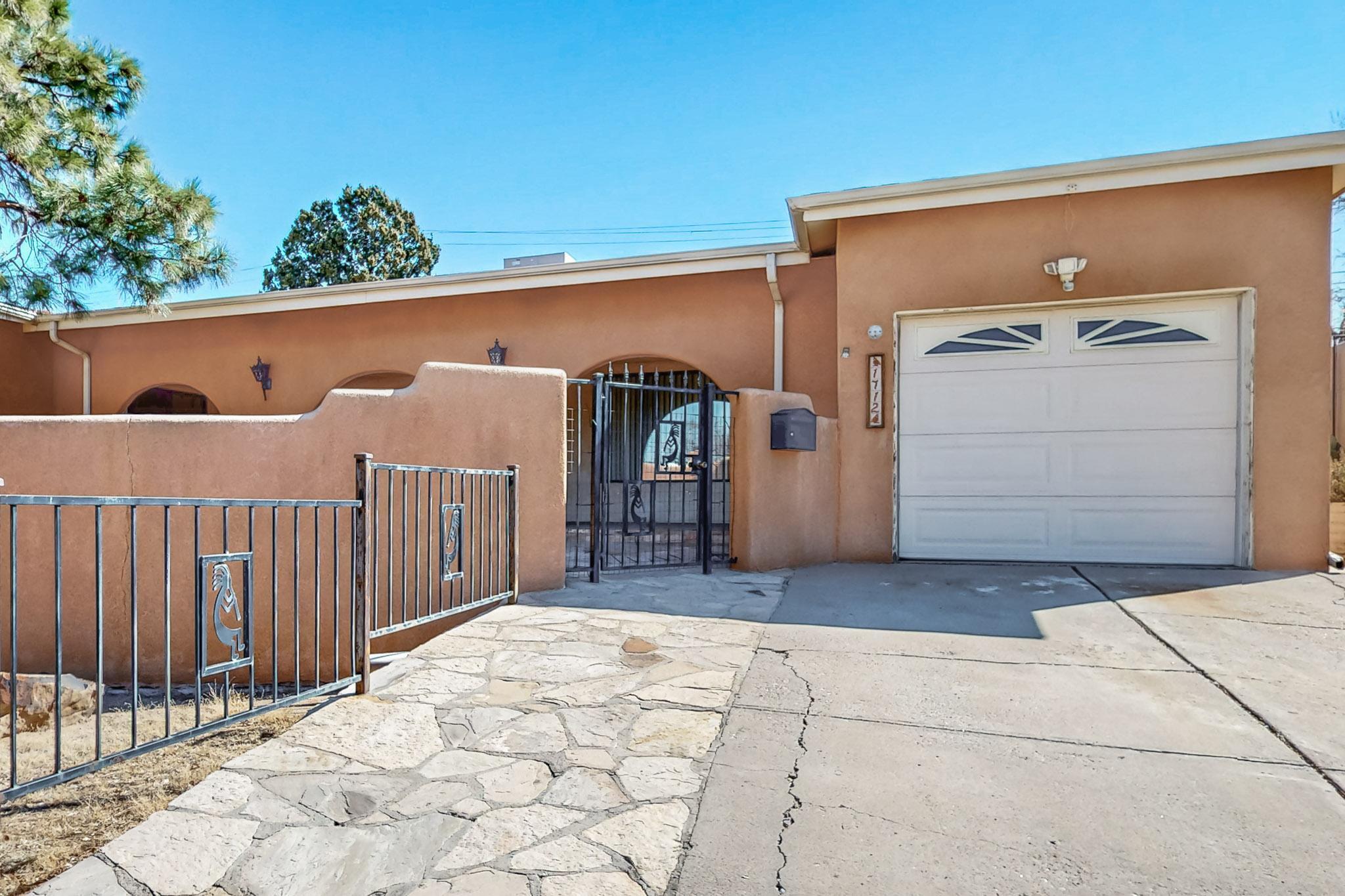Cozy and Spacious Home just blocks away from the vibrant heart of Uptown shopping, dining and enterainment.  This home features a pitched roof not offten found in this style and a finished one car garage with electric door opener.  As you approach, you'll be captivated by the large private courtyard and double-door entry.  Primary Bedroom featuring a double-door entry and ensuite bathroom with two separate vanity areas.  Use your imagination with former hottub room... Luxury Closet, Nursery, Sitting Room.  Extra large utility room has space for a craft tabel, or folding area includes a very nice size pantry.   Extra large den with wood burning fireplace makes for a cozy winter gathering space.