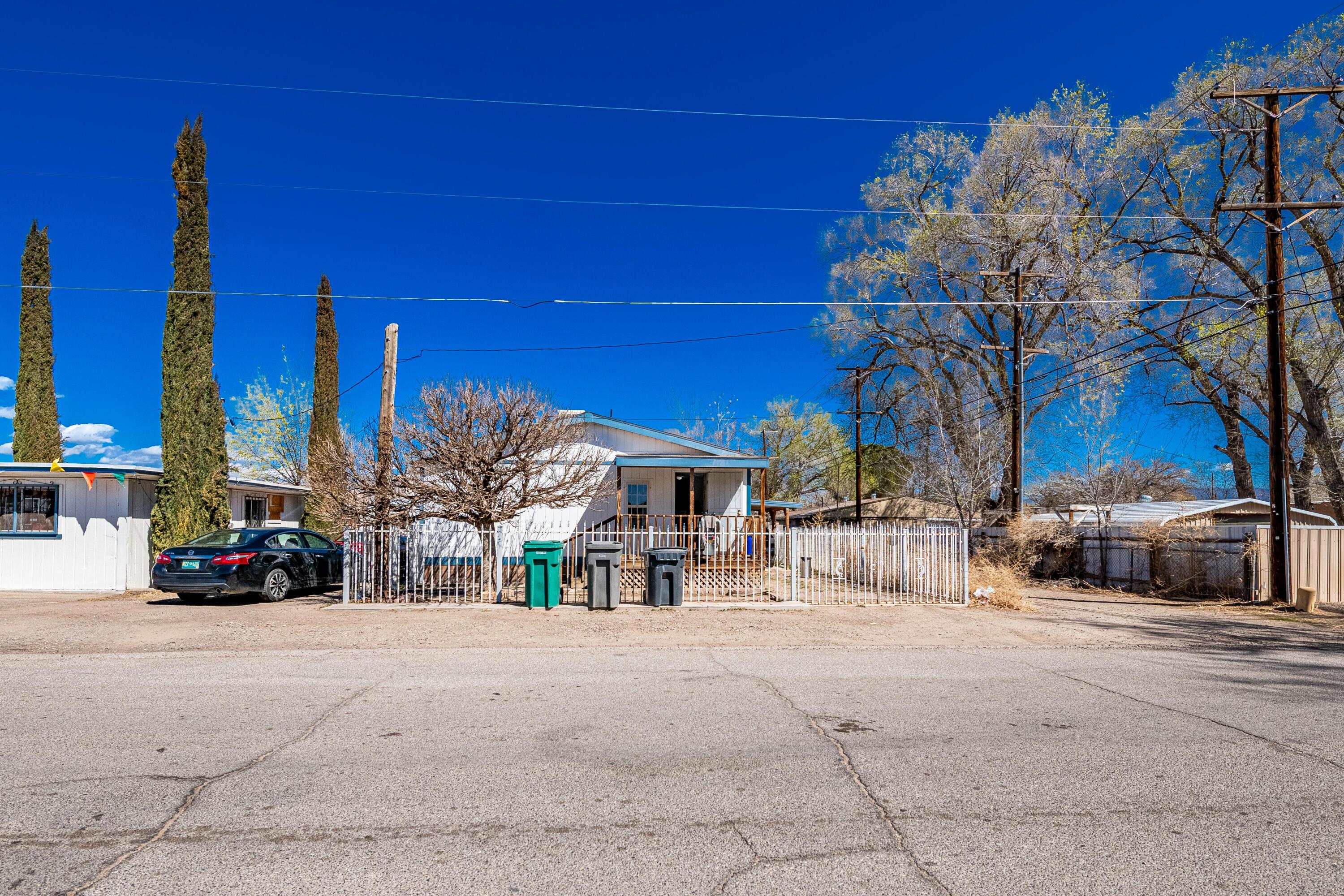 Seller now offering $4,000 Flex cash! Don't miss this incredible investment opportunity! This unique property offers both a commercial shop/office/store with living quarters and a mobile home--all on the same lot. Situated in a high-traffic area with excellent visibility, it's ideal for business owners, investors, or anyone looking for a versatile live-work space. Whether you're expanding your business or seeking rental income, this property offers endless potential. Seize the chance to own a prime commercial and residential space in one! Schedule your showing today!