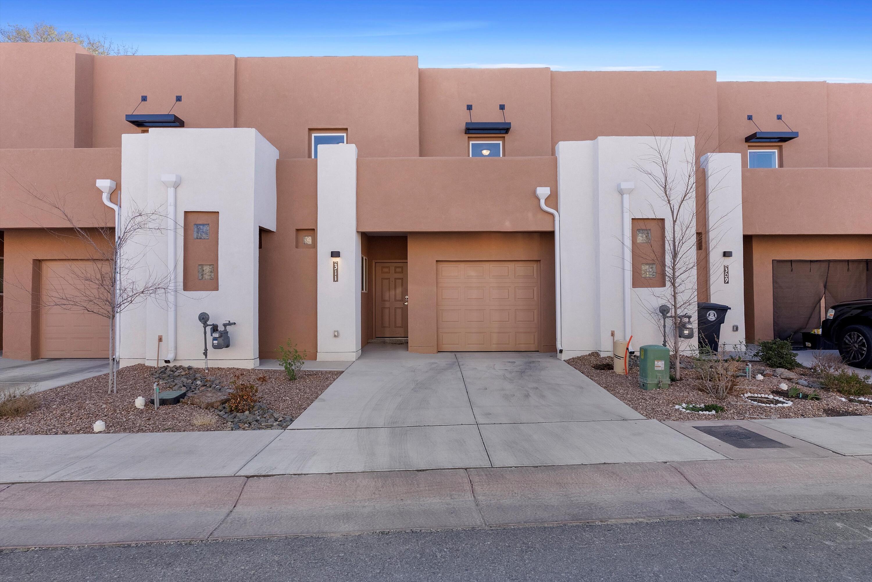 ''This sleek, contemporary home by Twilight Homes epitomizes modern luxury. Spanning 1,545 sq ft, it offers 3 bedrooms, 3 bathrooms, and two spacious living areas. High-end finishes include raised ceilings, granite countertops, luxury vinyl flooring, and a covered front porch. The chef's kitchen boasts stainless steel appliances, custom cabinetry, and a large island. The primary suite features a spa-like bath with a walk-in shower and dual vanities. Energy-efficient upgrades include Low-E windows, a programmable thermostat, and an energy-efficient gas furnace. Enjoy a landscaped yard with a private patio, perfect for entertaining. Near top-rated schools, shopping, fine dining, and minutes from downtown and highway access. Modern style, comfort, and efficiency--don't miss this opportunity!'