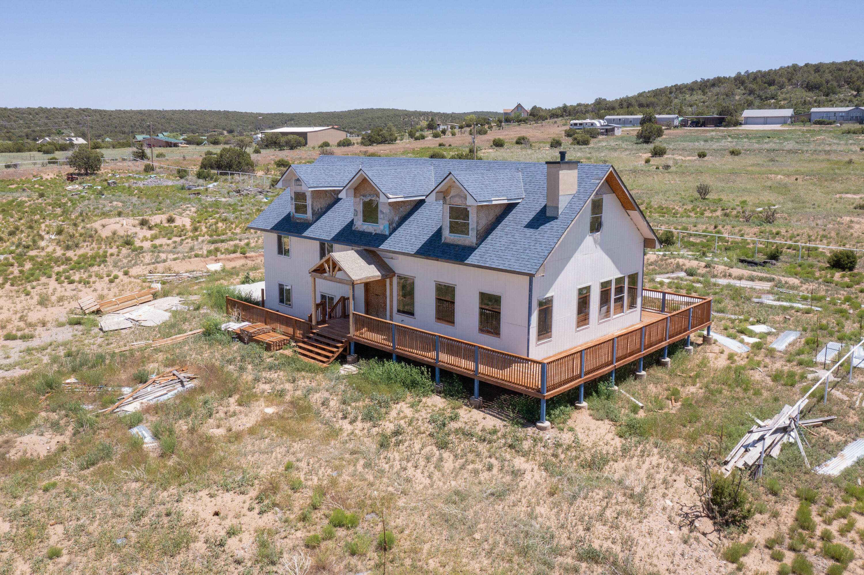 Are you looking for a unique opportunity in Sandia Park? Look no further! This lot offers breathtaking panoramic views and features a partially built home that's already been framed--just waiting for the right buyer to bring their vision to life. With potential equity in the area, this is your chance to finish a project and create your dream home in a stunning mountain setting.
