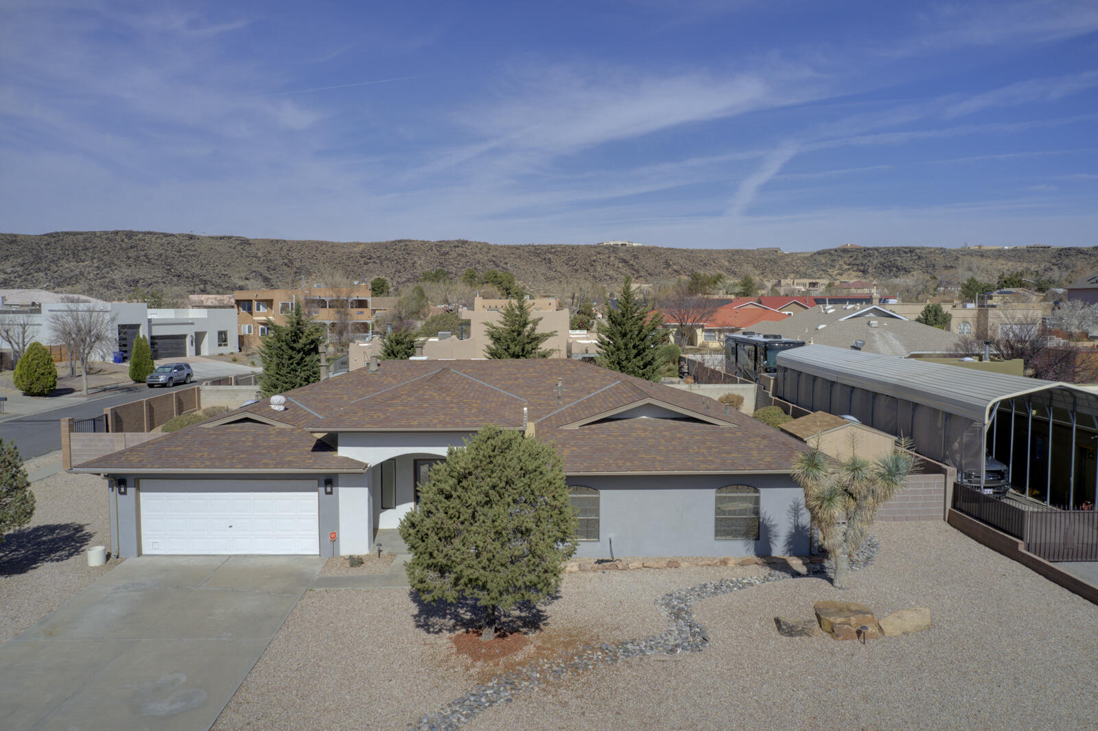 OPEN House on Sunday, March 23rd from 11:00-1:00!! Step into this stunningly remodeled single-story home on a spacious corner lot! With an open-concept design, a large kitchen, and inviting living spaces, this home is perfect for modern living. Featuring 4 bedrooms, 3 baths, and gorgeous updates throughout, it's both stylish and functional. The private backyard boasts gated access, a covered patio, a charming kiva fireplace, and the perfect space for entertaining. Don't miss out--schedule your showing today!