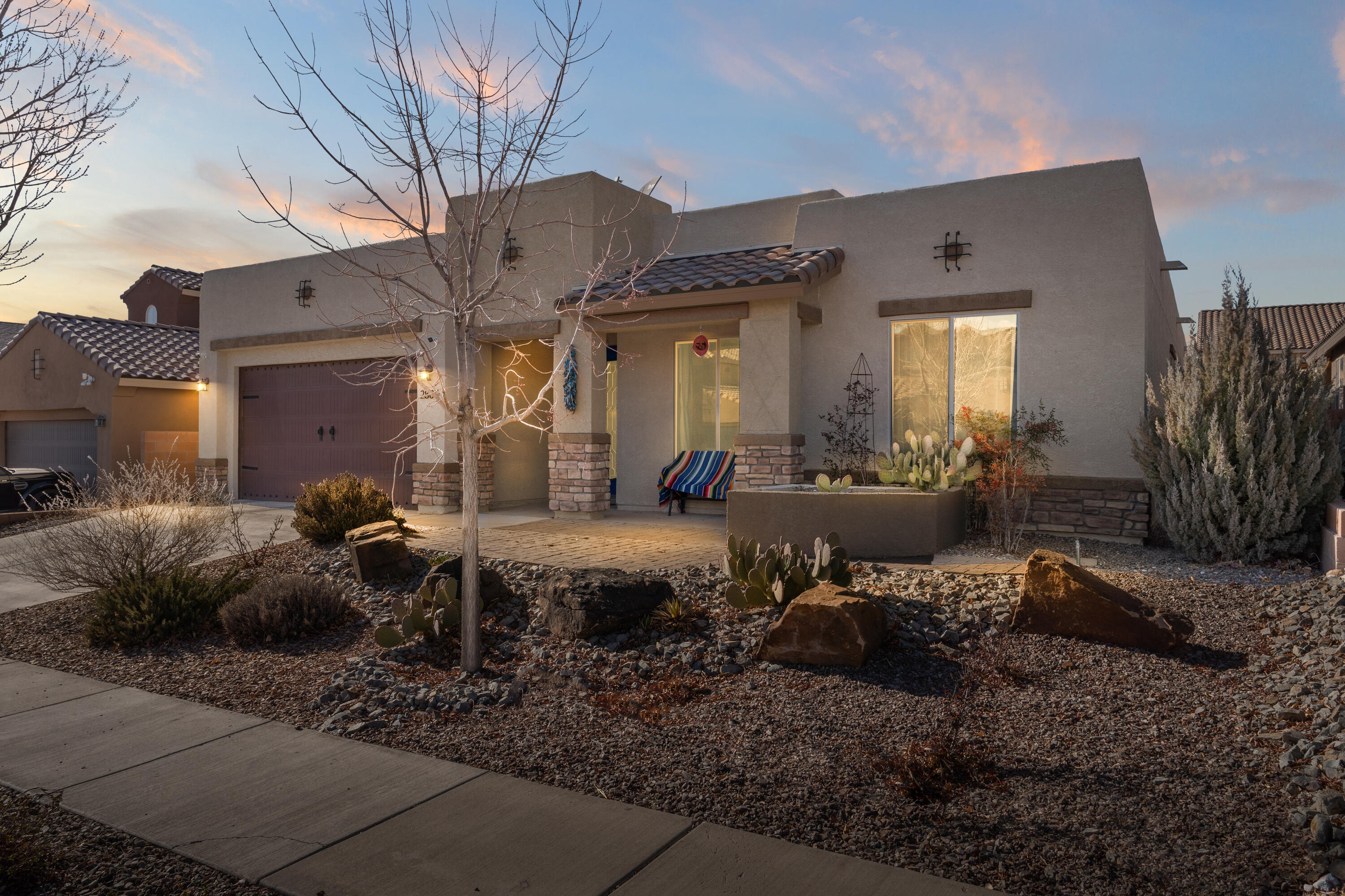 Experience luxury living in this beautiful 3-bedroom, 2.5 bath home featuring 9-foot ceilings, abundant natural light, and versatile bonus spaces. Nestled in the highly desirable Cabezon community, this home is just under three miles from Intel, close to Cottonwood Mall and offers quick access to local shopping, dining, and recreational areas. The highlights of this home include a large open concept kitchen, dining and main living room with two multi-functional bonus rooms, a spectacular outdoor living area and a separate office space off of the kitchen, a space for all your needs. The stunning kitchen showcases stainless steel appliances, a huge kitchen island with seating and sleek granite countertops.
