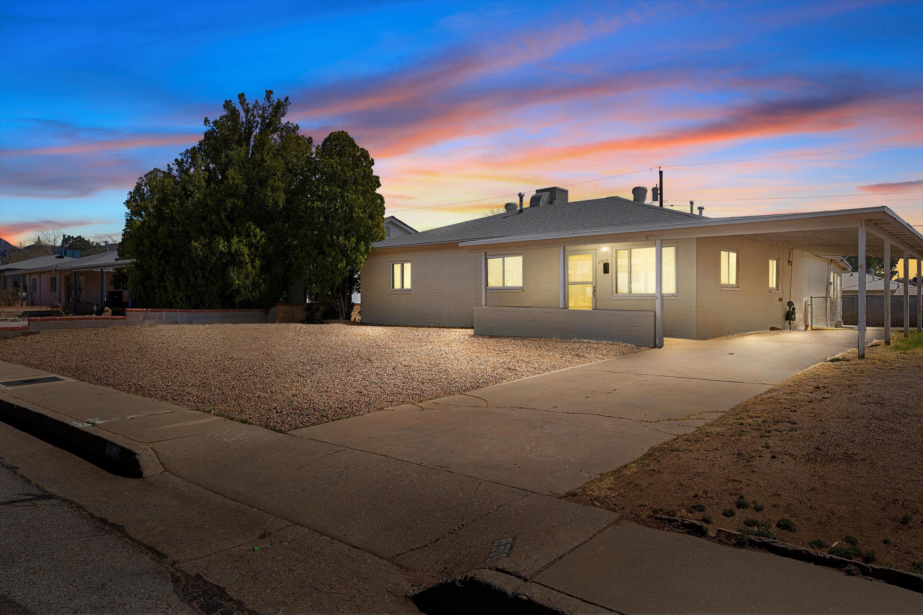 WOW!  Well-maintained and roomy 4-bedroom, 1.5-bath home in the heart of Albuquerque's desirable Hoffmantown neighborhood! This inviting property offers two living areas plus a bonus room or possible 5th bedroom, providing plenty of flexible space for work, hobbies, or relaxation.Enjoy cozy evenings by the wood-burning fireplace, and peace of mind with a newer roof and brand-new heating and cooling systems. The home also includes all appliances for added convenience. A screened rear porch offers the perfect spot to enjoy outdoor living year-round.Located super close to Hoffman Park, this home boasts stunning Sandia Mountain views and easy access to shopping, dining, and major roads. Don't miss this opportunity to own a centrally located gem in sought-after Hoffmantown!