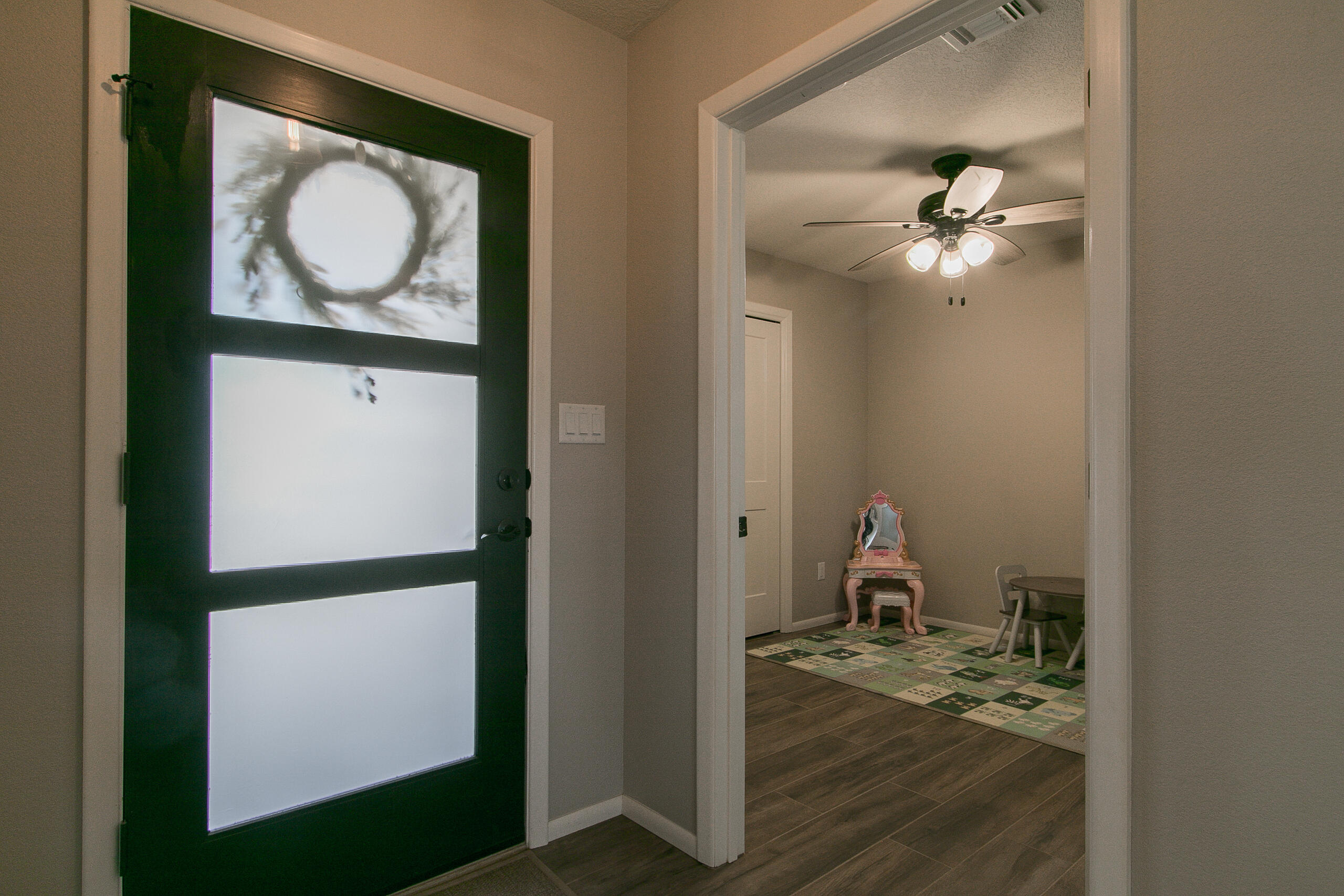 2.99% VA Assumable Loan. Beautiful 4-Bedroom Home with Modern Upgrades & Stunning Mountain Views on a 1 acre lot!Welcome to this gorgeous 4-bedroom, 2-bathroom home, offering 1,622 sq. ft. of thoughtfully designed living space. Built in 2021, this home boasts modern upgrades, an open floorplan, and breathtaking mountain views, making it the perfect blend of comfort and style.Wood-look tile flooring throughout the main living areas, with cozy carpeting in the bedrooms. The spacious living area features a charming wood stove, ideal for warmth and ambiance. The open-concept kitchen is complete with farmhouse-style raised panel glazed cabinets, granite countertops, a recessed stainless steel sink, and a convenient breakfast bar. Stylish oil-rubbed bronze light fixtures and ceiling fan