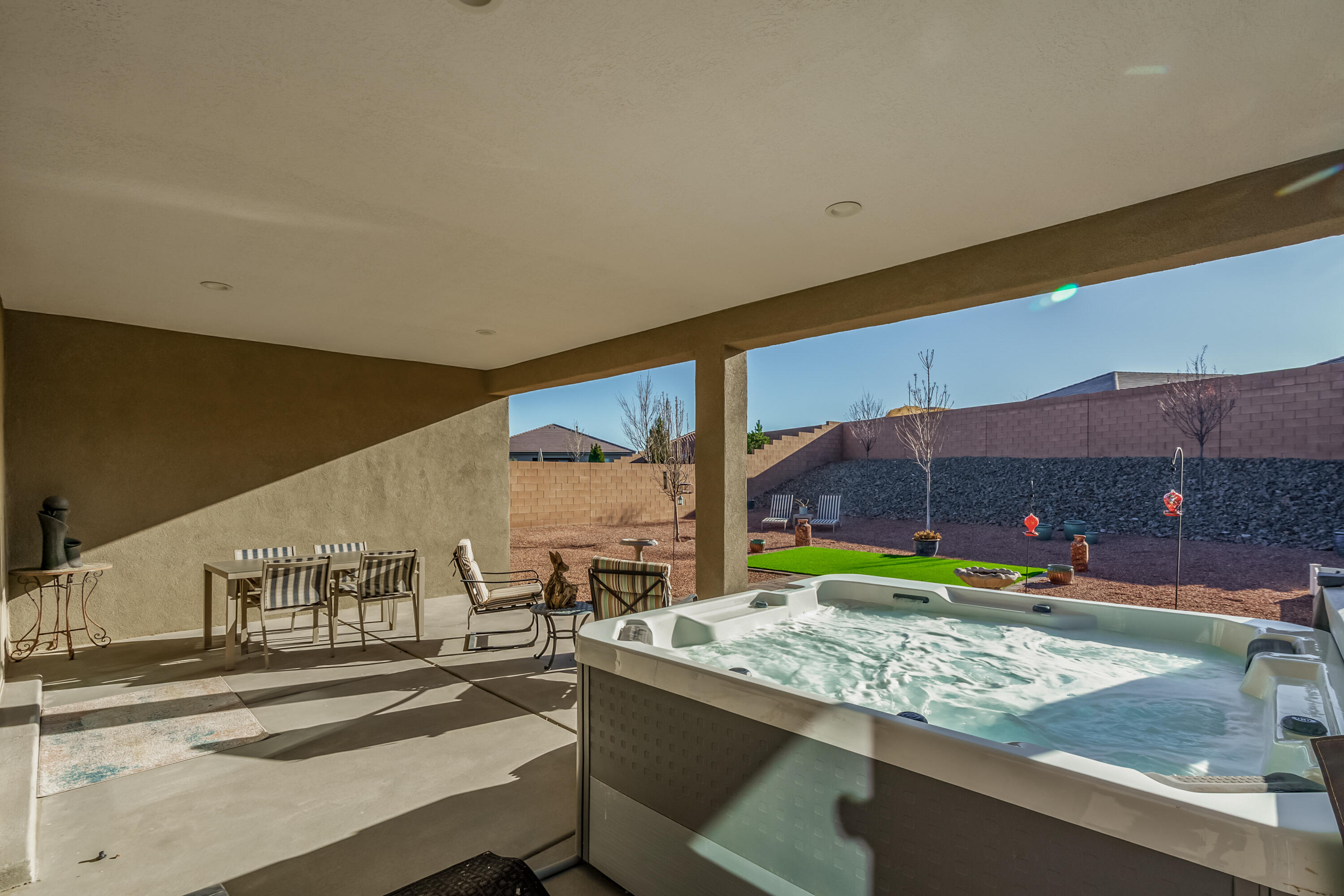 Why Build!?  Discover this EXQUSITE, 4-bedroom, single level DR Horton residence, built in 2022! Situated on a beautiful, large premium lot, showcasing a meticulously landscaped yard & expansive covered patio, offering privacy & a serene retreat!  Discover an open & bright floor plan, flooded with natural light & tile floors gracing the main living areas! The chef-inspired kitchen is a true standout, featuring quality appliances, 5-burner gas cooktop & elegant granite countertops. Abundance of cabinetry, a generous island w/bar seating & above pendant lighting creates a seamless flow into the dining area. The primary suite is thoughtfully separated from the other rooms for added privacy w/en-suite bathroom to include a walk-in closet & oversized shower with tiled surround! A MUST SEE!