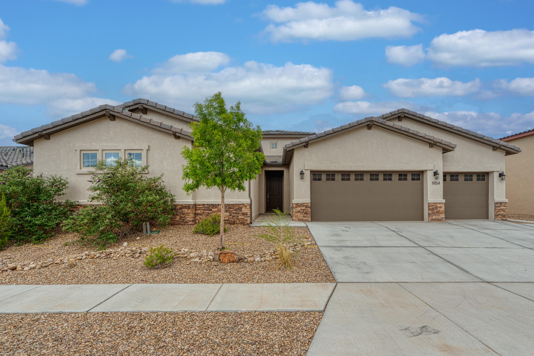 OPEN HOUSE SAT JUNE 28th 10:00AM-1:00 PM Stunning single-story home in gated Mariposa, perfect for multi-gen living with two spacious primary suites. One includes a private sitting room, mini fridge, full bath, walk-in closet, and its own washer/dryer. Open-concept kitchen features ample cabinets, large island, and stainless steel appliances. Dual sliding doors lead to a shaded patio with scenic views. Finished 3-car garage with 220V plug. Enjoy community center, pool, parks, and more--just 10 mins to city center, shopping, and dining off HWY 550.