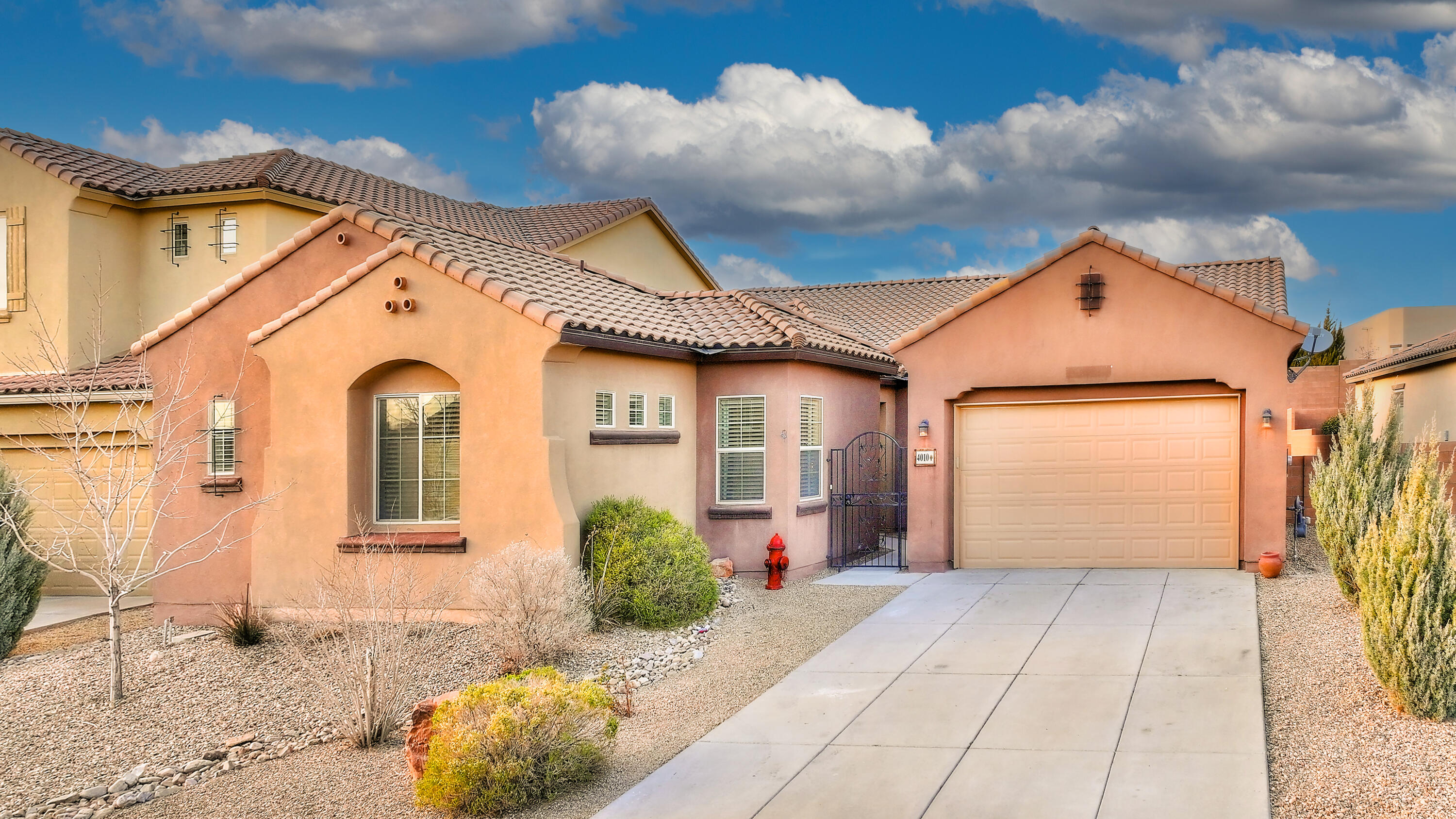 Located in the prestigious gated enclave of Tres Colinas, Loma Colorado, a residence of refined elegance unfolds. Dual primary suites, complemented by three additional bedrooms and three and a half baths. A chef's kitchen, showcasing bespoke cabinetry, artisanal backsplash, and stainless steel appliances, anchors the heart of the home, while granite surfaces grace every corner. A secluded courtyard and dual-zone climate control ensure year-round serenity. The huge great room adorned with built-in bookshelves and upgraded tile, opens to a generous covered patio, seamlessly blending indoor and outdoor living. Custom window treatments, expansive closets. A dedicated laundry room and formal dining area complete the ensemble.