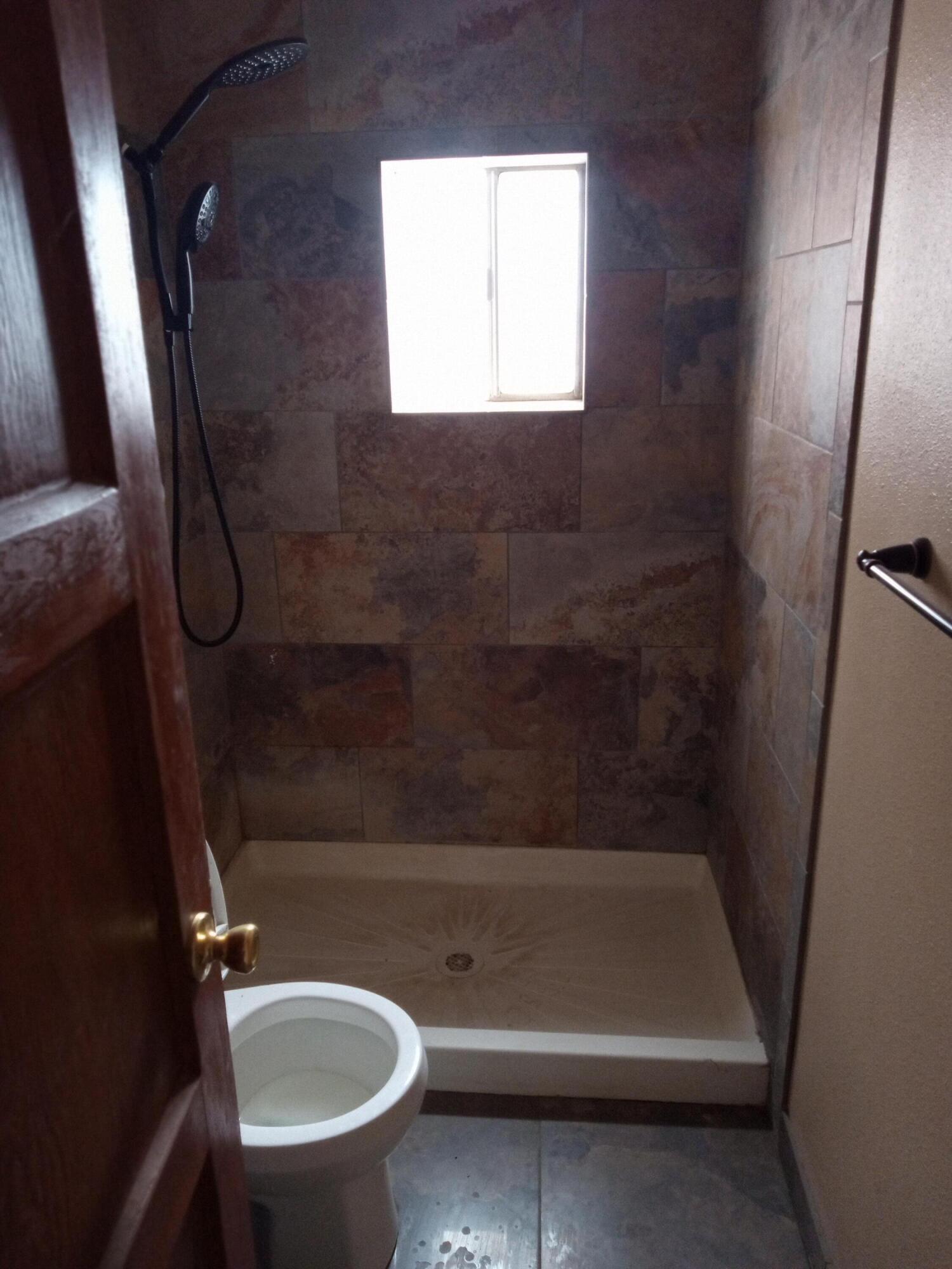 Come see this charm. Tucked away for privacy. Extra Large Garage, 3 rooms, Fireplace, Master has private entrance, Refrigerated combo unit. Updated electrical panel.