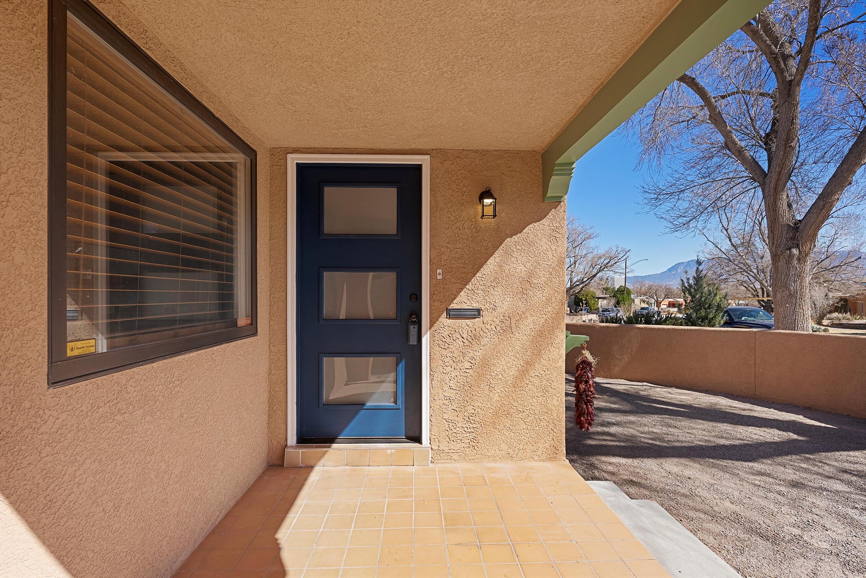 This light & bright Ridgecrest home has an updated kitchen w/ stainless appliances and new quartz counters, original hardwood floors, plus new paint, fixtures and blinds throughout. Large primary suite has updated ensuite bath, large walk-in closet and it's own access to a very private patio and courtyard. Brand new TPO roof and furnace recently maintenanced. Lots of storage space w/ large closets and built-in cabinets. Large 2 1/2 car garage tucked away in rear plus lots of additional off-street parking. Great location on tree lined street just blocks from Ridgecrest park.