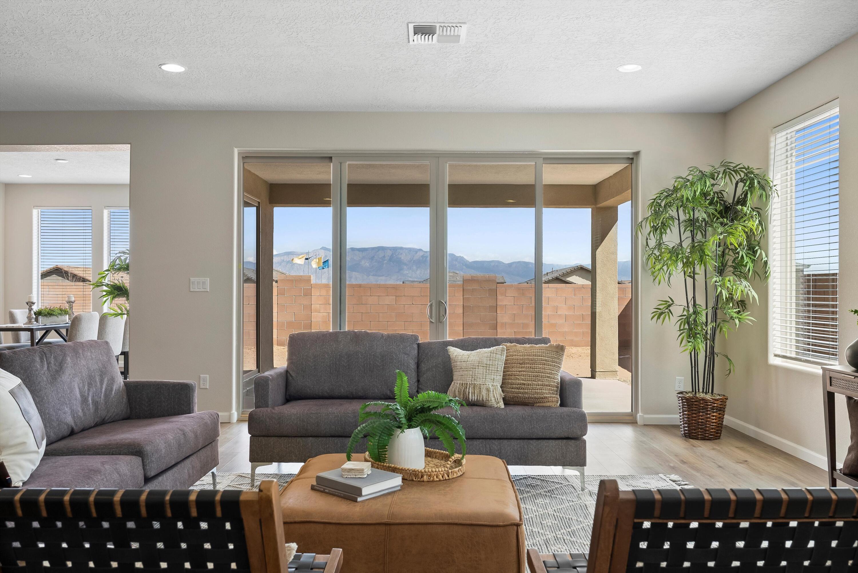 This stunning 4 BR, single-level Pulte Parklane model in highly sought-after Los Diamantes offers the perfect blend of elegance & functionality. With breathtaking mountain & sunset views, this home is designed for both comfort & style. Step inside to find an open-concept layout w/spacious living areas & abundant natural light. The gourmet kitchen is a chef's dream, featuring black mist honed granite  countertops, a large island, stainless steel appliances & ample cabinetry. The primary bedroom ensuite is a private retreat with walk-in closet & granite dual vanities. 3 additional BRs provide flexibility for guests. There's also a home office or hobby room. The 3-car garage offers plenty of space for vehicles, storage or a workshop. Don't miss the opportunity to own this exceptional home!