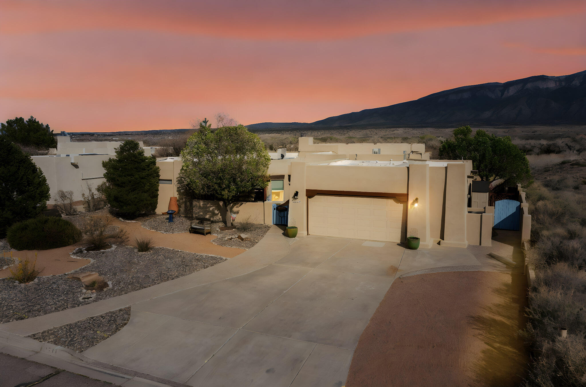 Southwestern Elegance with Breathtaking Views! Nestled in the heart of New Mexico's stunning landscape, this exquisite 3 (possible 4) bedroom, 2.5-bath home with an attached Casita is a masterpiece of Southwestern luxury. Designed to embrace its unparalleled surroundings, every detail of this residence exudes warmth, charm, and sophistication.Step inside to soaring ceilings adorned with vigas, corbels, & tongue-and-groove detailing, creating a rich, inviting atmosphere. A magnificent kiva fireplace anchors the living space, offering both beauty and warmth. The sophisticated Southwestern farmhouse kitchen is a showstopper, featuring a tin ceiling, custom cabinetry, hand-painted tile backsplash, a butcher block island, and expansive windows that flood the space with natural light.