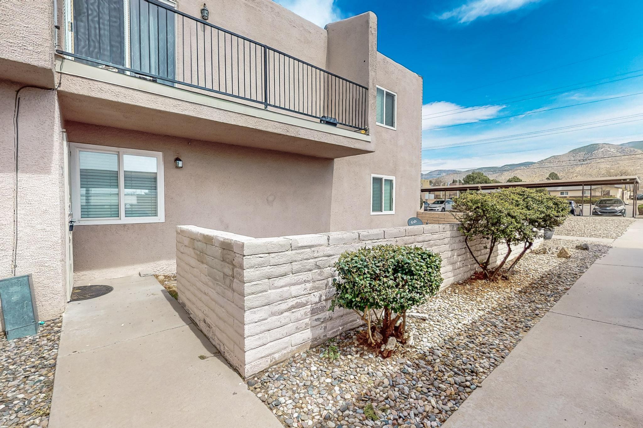 Welcome to your next home! This lovely 3-bedroom, 2-bathroom condo in the heart of Albuquerque is move-in ready and waiting for you. The downstairs unit features a beautifully updated kitchen with sleek stainless steel appliances and convenient storage area. Enjoy hard floors throughout and stay cool with refrigerated air on those warm New Mexico days. The primary bedroom boasts a spacious walk-in closet, while a private patio offers the perfect spot for morning coffee or evening relaxation. Located near amenities, this cozy condo combines comfort with convenience.