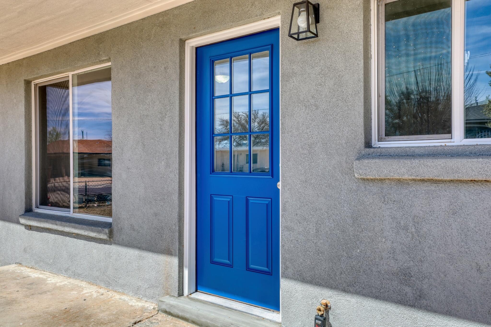 This house comes with a REDUCED RATE as low as 5.875% (APR 6.165%) as of 05/01/2025 through List & Lock(tm) WELCOME TO THE BLUE-DOOR BEAUTY YOU'VE BEEN WAITING FOR! --  what's not to love! Behind that bold entrance lies a home completely transformed--fresh stucco wraps the exterior, updated windows invite light into every room, and modern mini splits keep the space perfectly comfortable. Step onto modern laminate flooring with updated electrical and plumbing systems! This home provides  the confidence of a solid foundation. The kitchen shines with marble counters and sleek finishes, while the bathrooms have been fully redone for everyday luxury. Call today for more info!