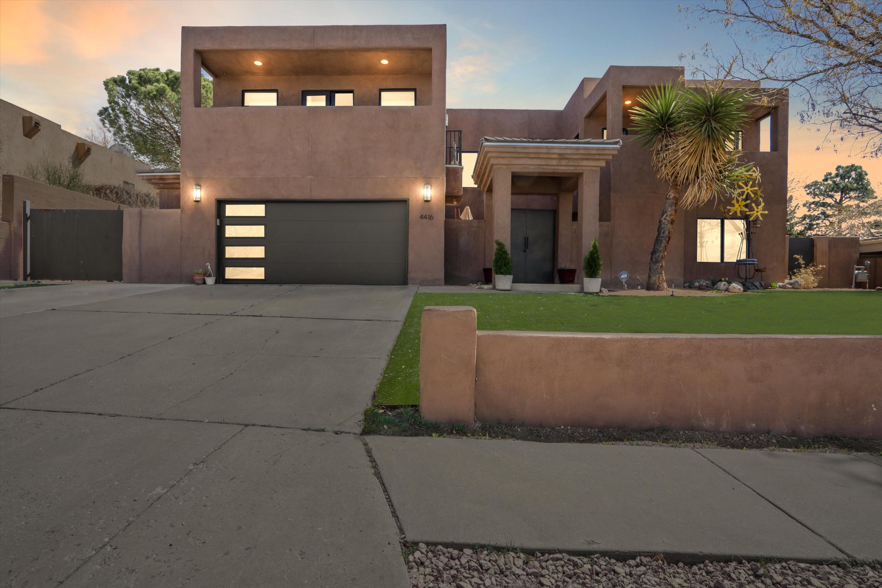Welcome to Glenwood Hills. This exquisite, modern home has it all. 6 bedrooms, with 2 Primary Suites- One on the main floor and one upstairs, 4 bathrooms, 2 living areas. The kitchen is a Chef's dream, complete with a commercial style gas range with double oven, Monogram Refrigerator, 2 dishwashers and a wine fridge. Upstairs primary en suite includes a steam shower, soaking tub and custom walk in closet. Unwind in the private backyard next to your wood burning fireplace or enjoy your morning coffee on one of the many balconies. You must see this one in person to appreciate the custom finishes. Schedule a tour today.