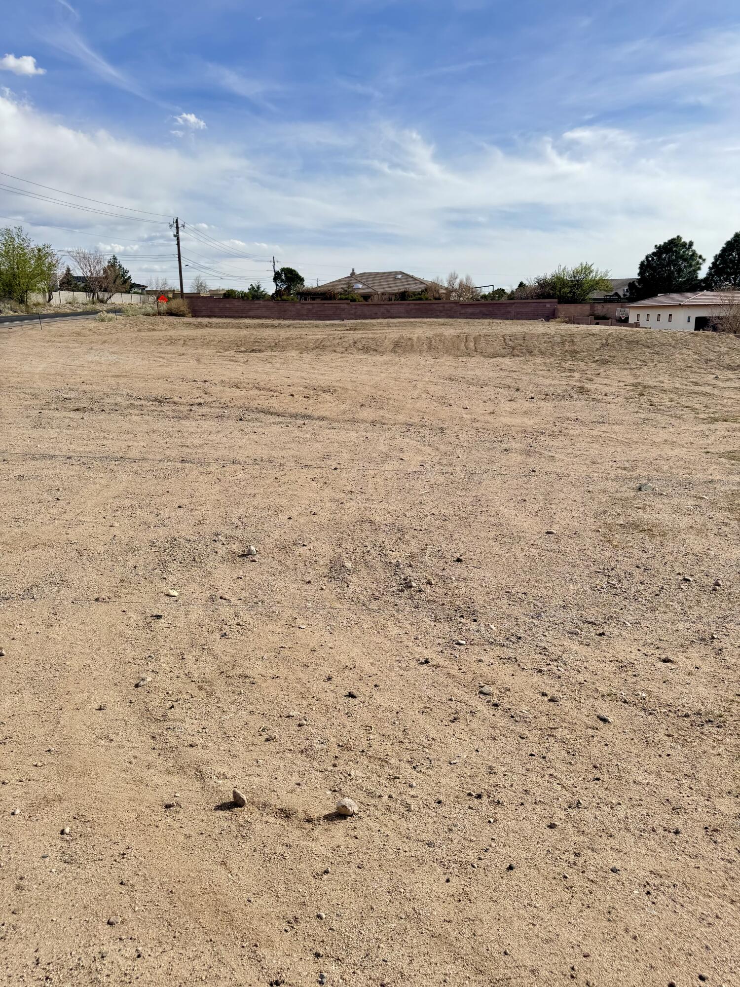 The lot is conveniently located in a quiet, desirable neighborhood with easy access to local amenities. Build your dream home and enjoy the picturesque surroundings, whether you prefer a cozy single-story layout or a spacious two-story design.