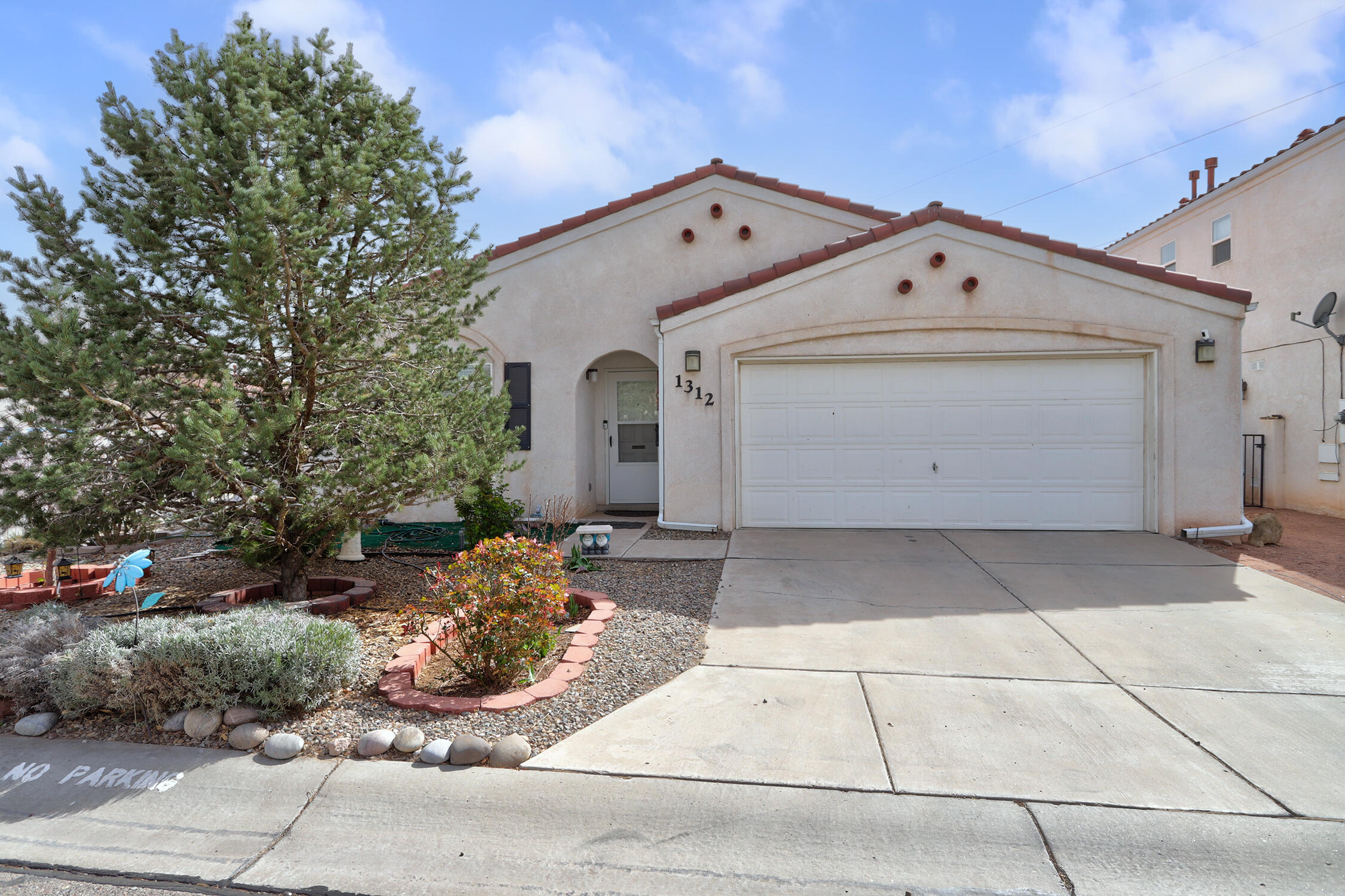 One story home in the North Valley's Vista del Norte neighborhood has 3 bedrooms and is located on a corner lot. There are vaulted ceilings, and abundant natural light. Open kitchen with lots of cabinets and counter space. All appliances stay with the home. The primary suite has a dressing area with lots of counter space, and a walk-in closet. The furnace, refrigerated air conditioner and hot water heater were installed in '23. Private backyard with a storage shed. Planed community with parks, walking trails and easy access to I25.