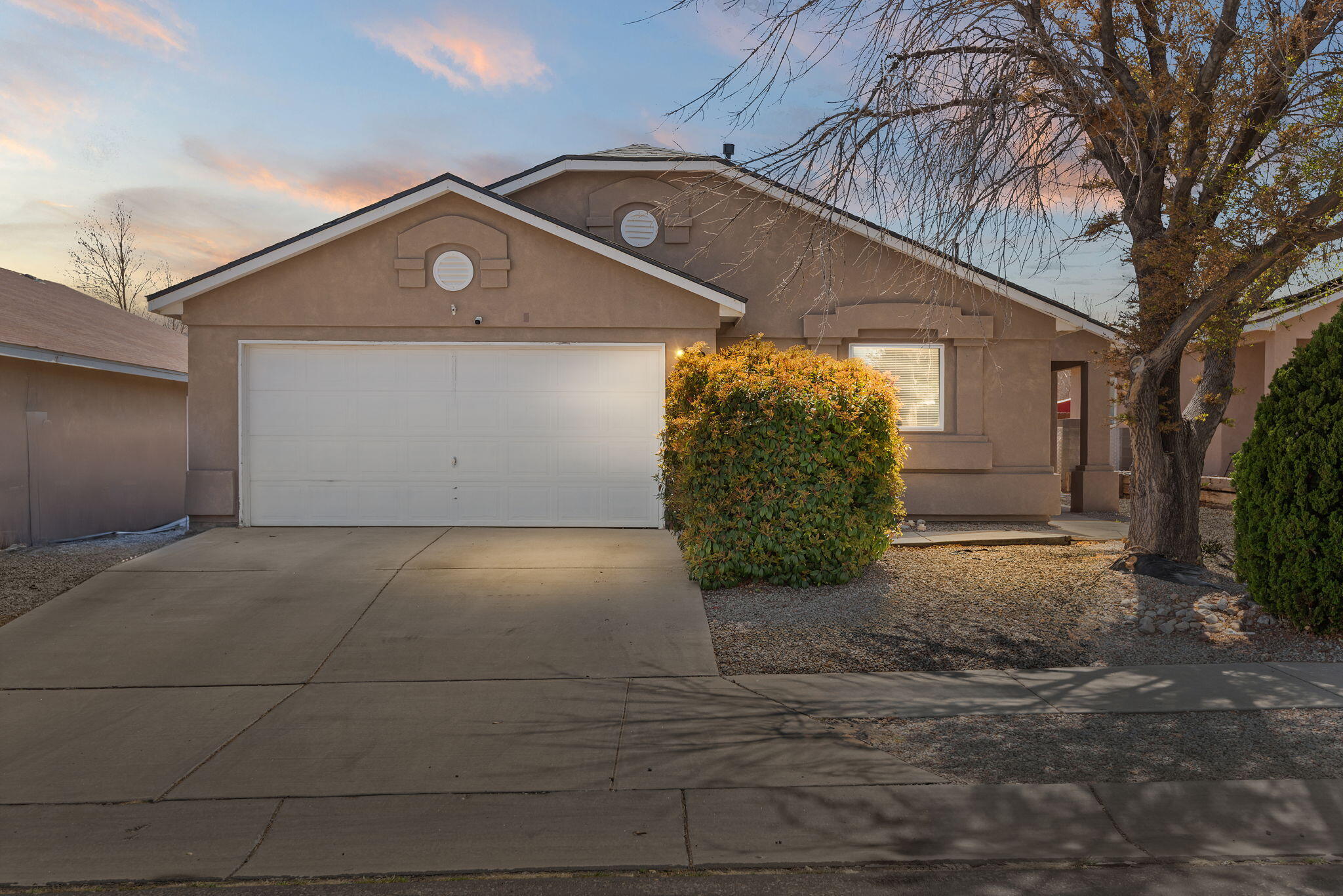 Step into your future with this cheerful and inviting home! Boasting 3 bedrooms and 2 bathrooms across 1,697 square feet, this well-designed floor plan offers both comfort and flexibility. Enjoy meals in the cozy, tucked-away dining area that flows effortlessly into a spacious living room -- a blank canvas just waiting for your personal touch. The generously sized backyard is perfect for family gatherings, weekend barbecues, or simply soaking up the New Mexico sunshine. Come make this happy home your own!