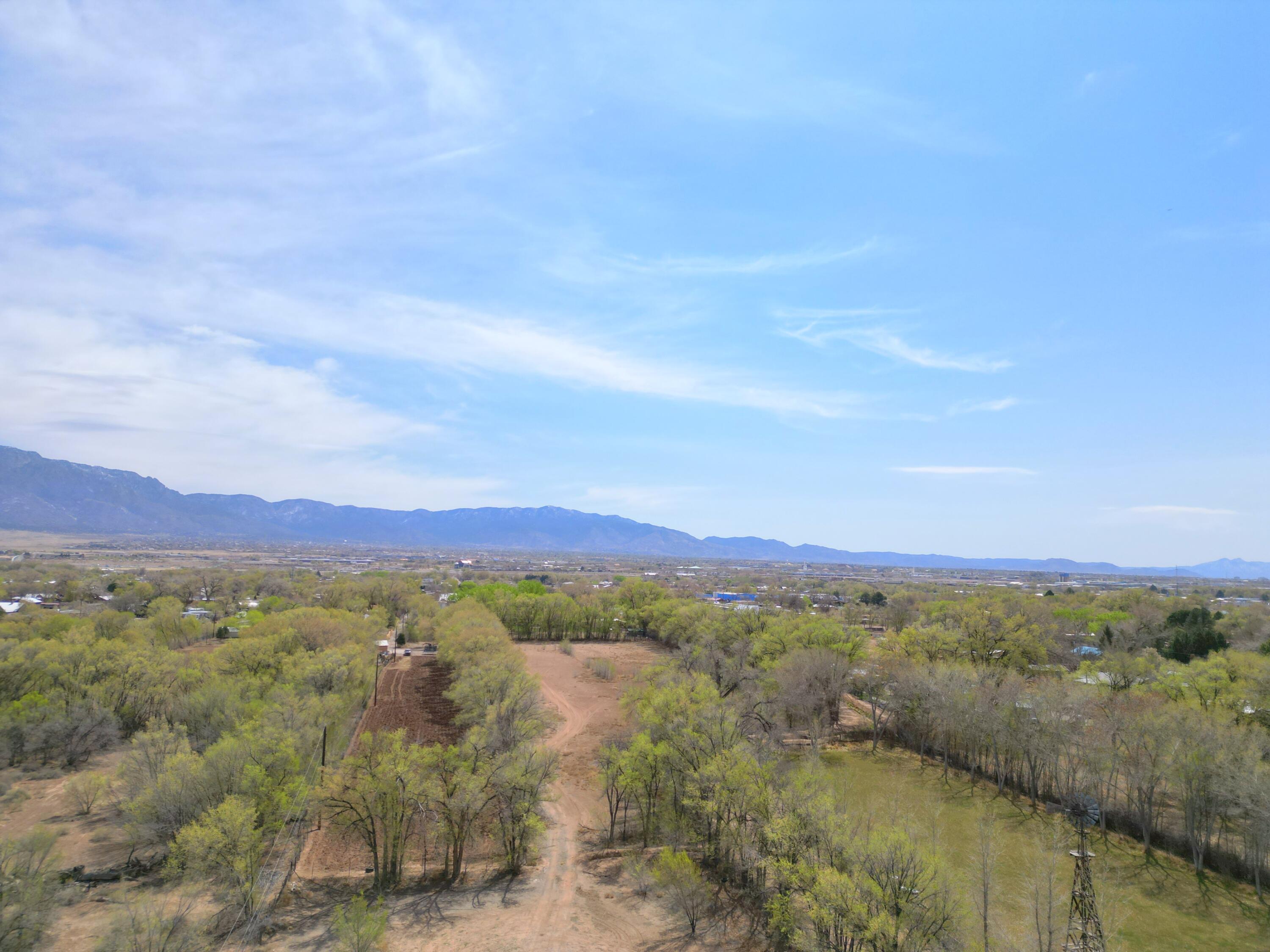 Escape to tranquility with this stunning 1.41 acre parcel. A hidden gem surrounded by majestic cottonwood trees. Nestled in a peaceful private setting. This beautiful property offers the perfect back drop for your dream home, weekend retreat or investment property. Let your imagination run wild on this breathtaking land. Don't miss out, schedule a visit today.**Sellers state they do not think the property has water rights. Feel free to contact the office of engineers to verify**